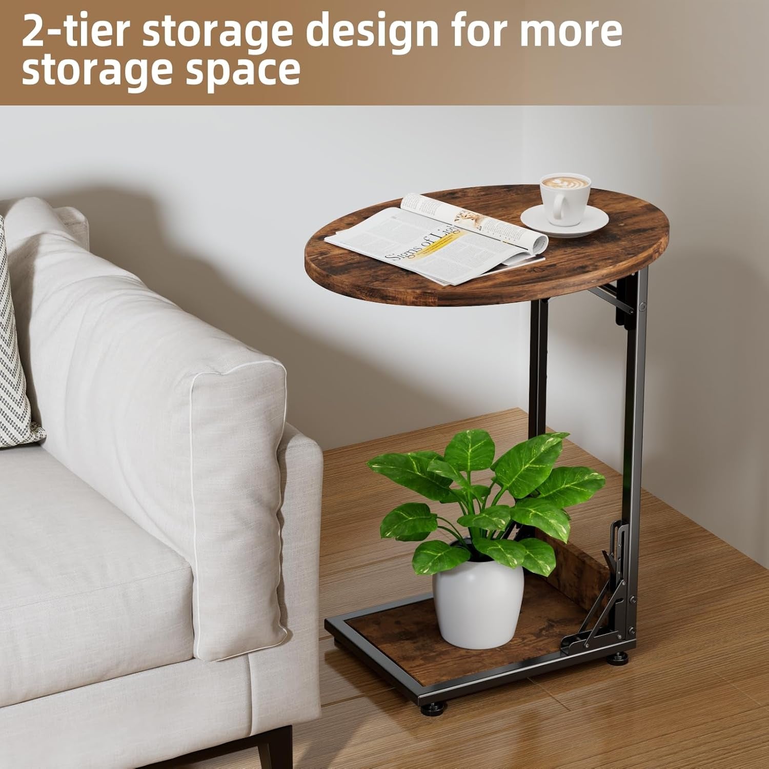 Side view of the two-tier table beside a couch with a plant on the lower shelf and coffee and newspaper on the round top.