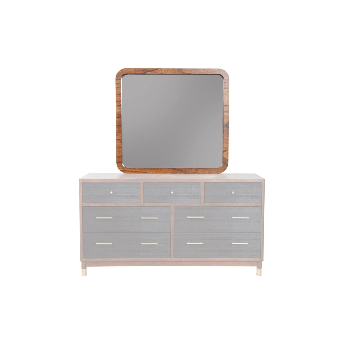 Brown-framed rectangular mirror above a light gray dresser, straight-on view