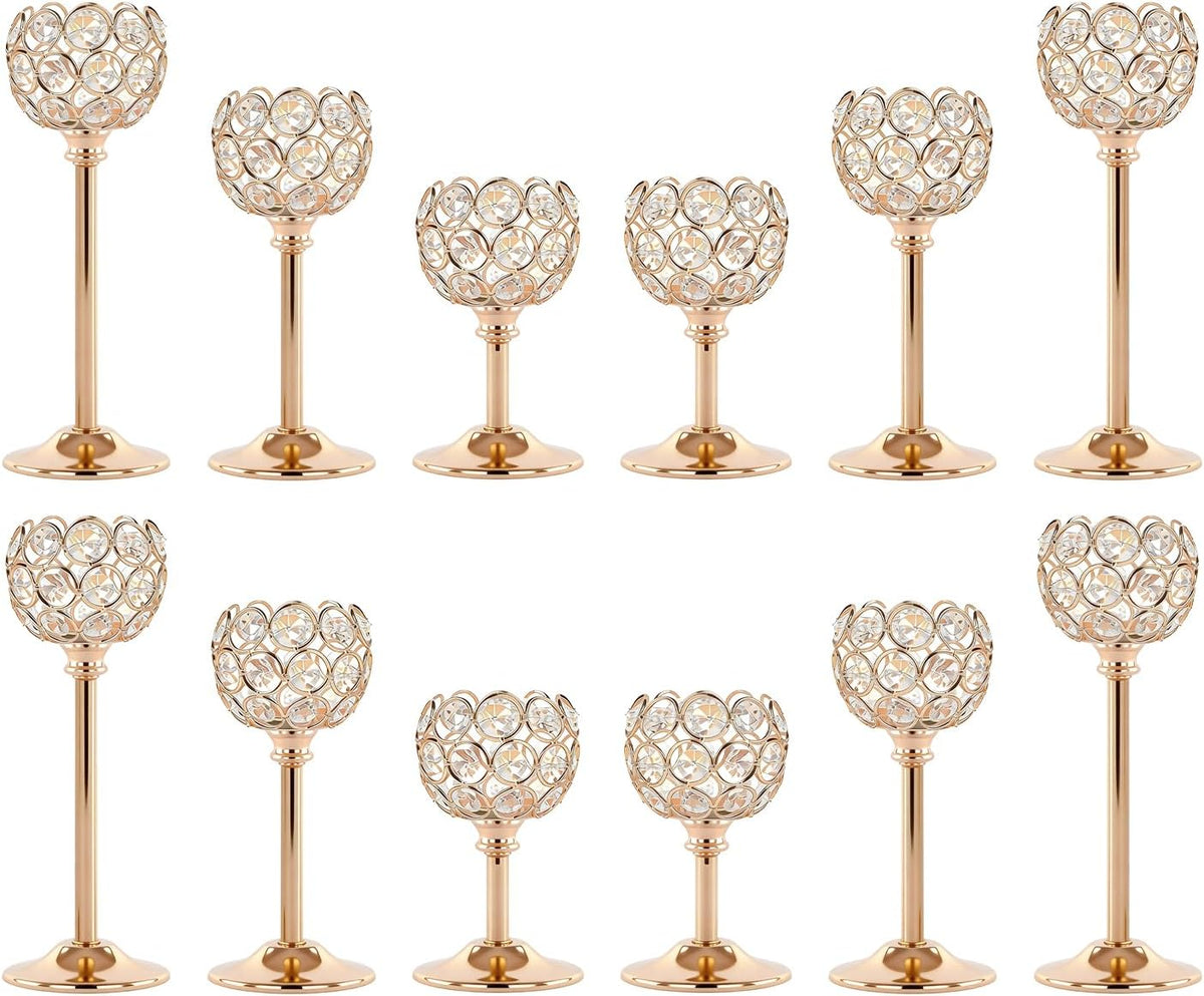 Staggered two-row studio shot of multiple gold crystal tealight holders in varying heights.