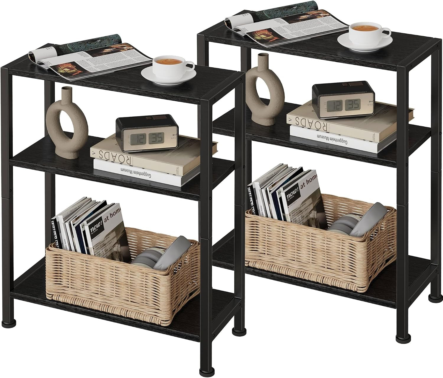 Two narrow three-tier side tables with dark wood shelves and black metal frames, styled with cups, books, a clock, vases and
