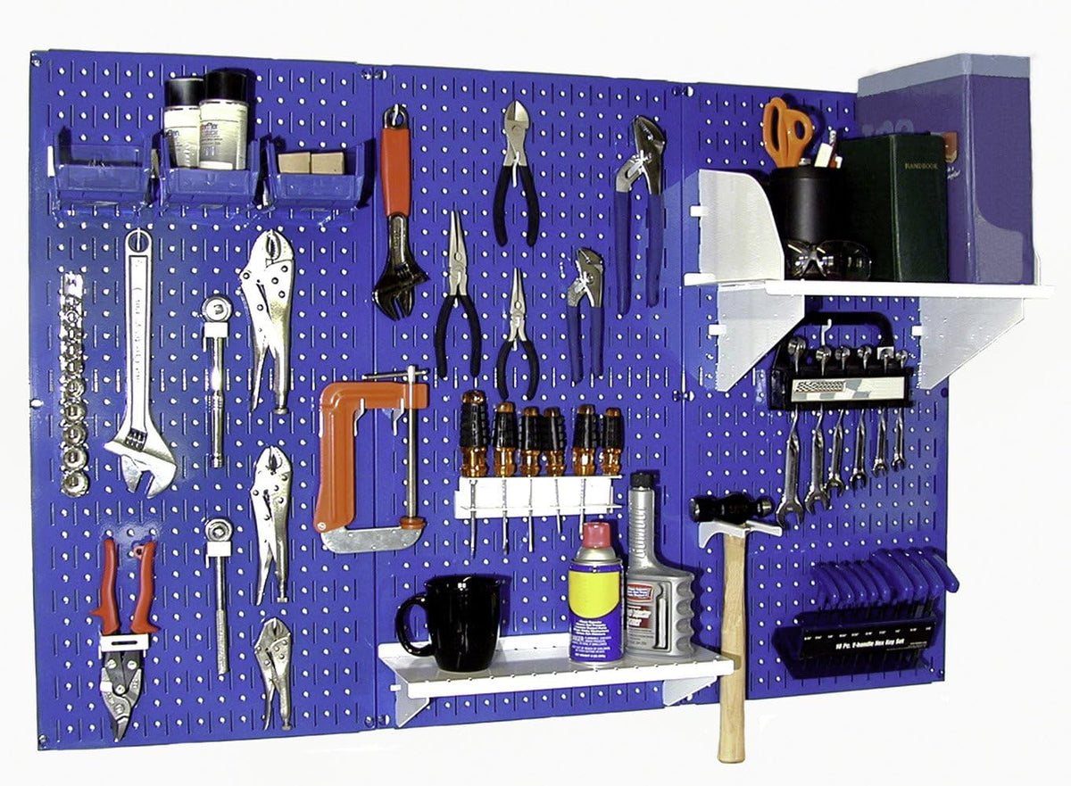 Blue metal pegboard displaying pliers, screwdrivers, shelves and a hammer hung neatly on hooks.