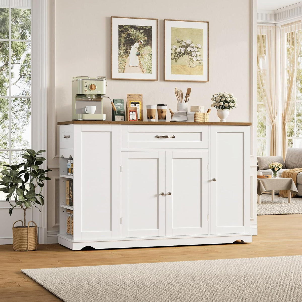 Styled kitchen scene showing white island topped with coffee maker and decor against a bright windowed room