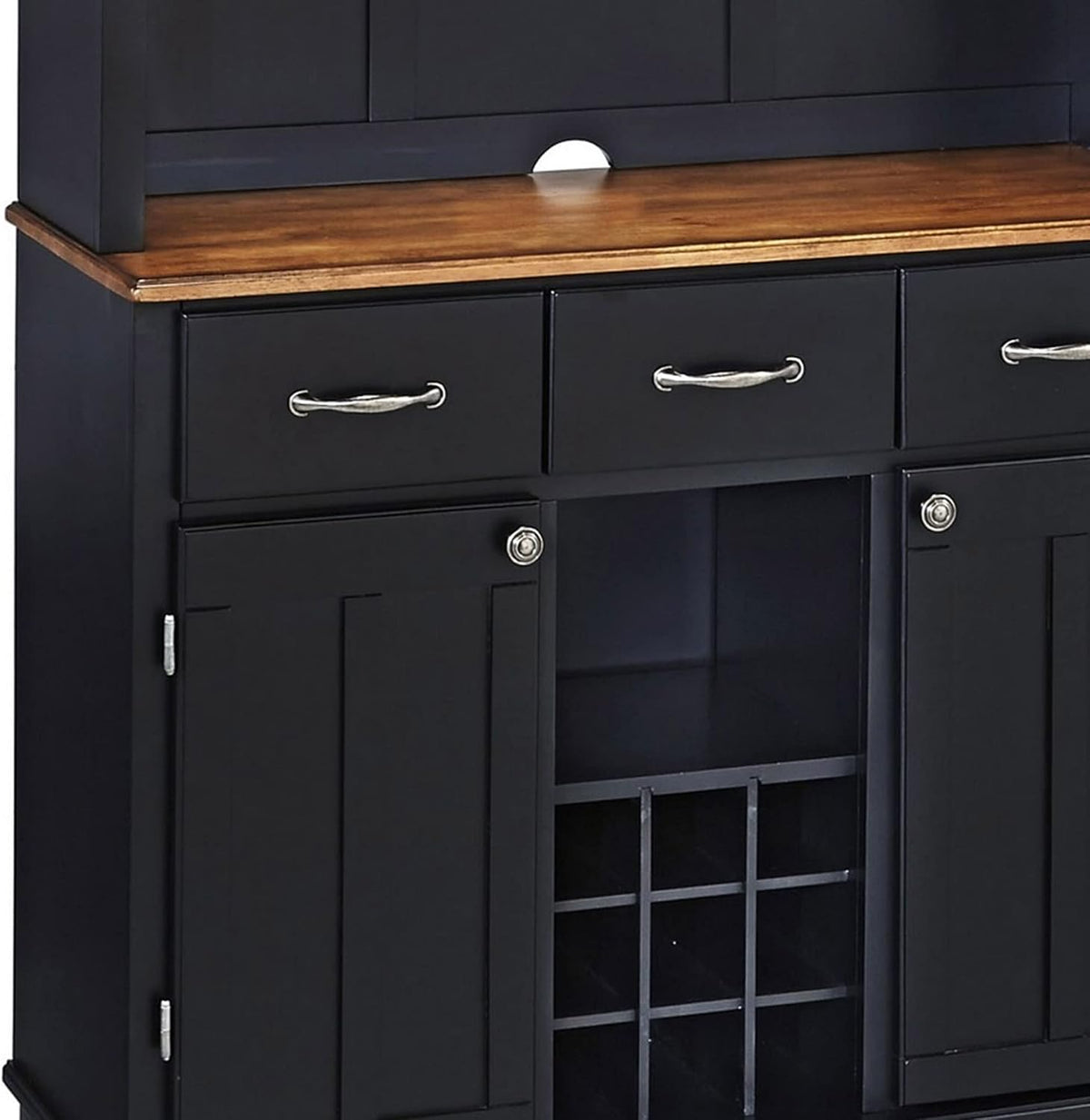 Mid-section close-up showing three drawers, brushed-steel handles and removable wine storage grid