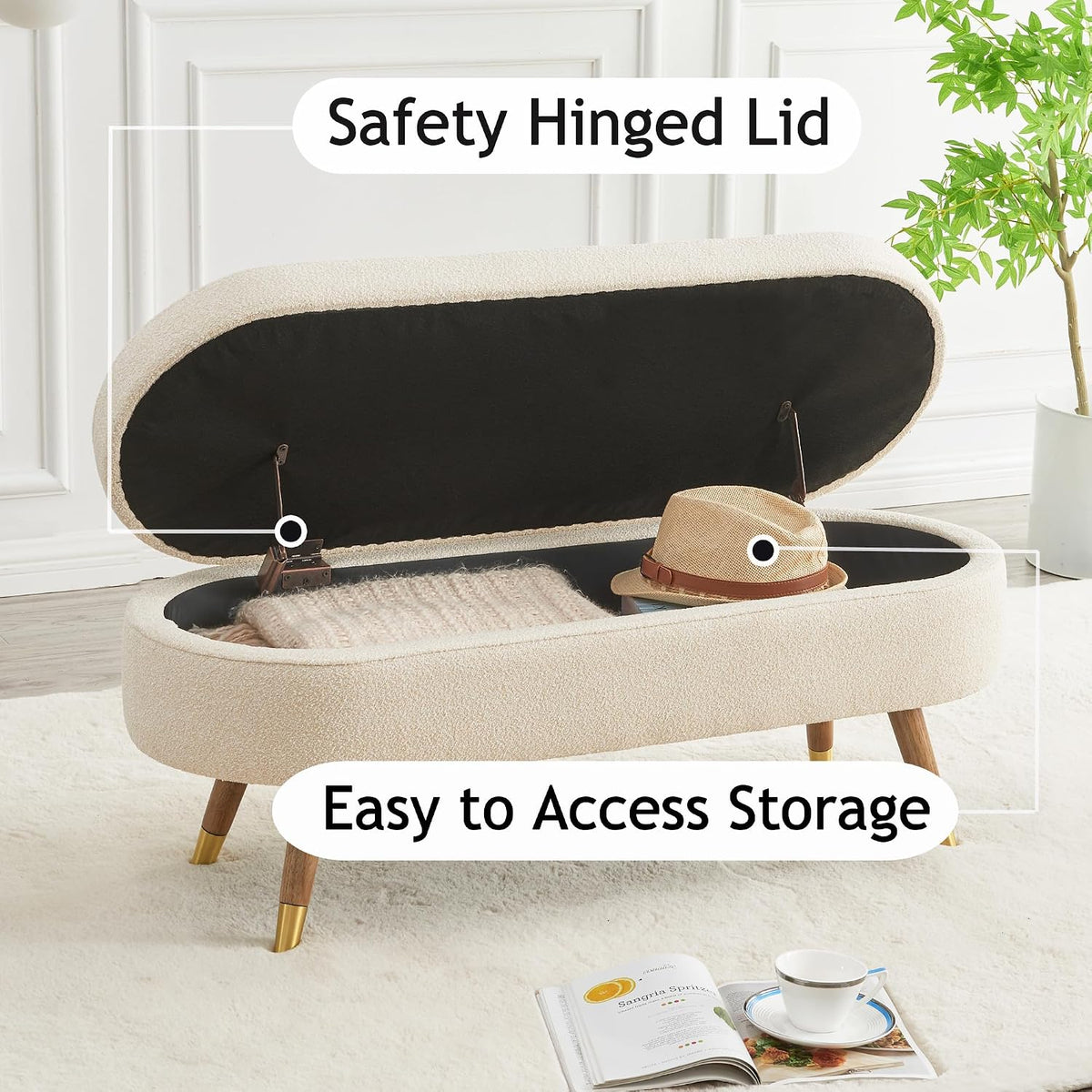 Open-top view showing safety-hinged lid and interior storage with a hat and folded blanket inside