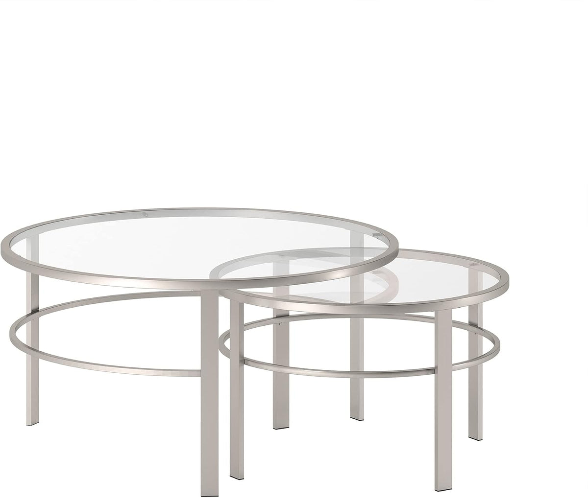 Pair of nesting round tables in a silver finish with clear glass tops and overlapping rims on a white background.