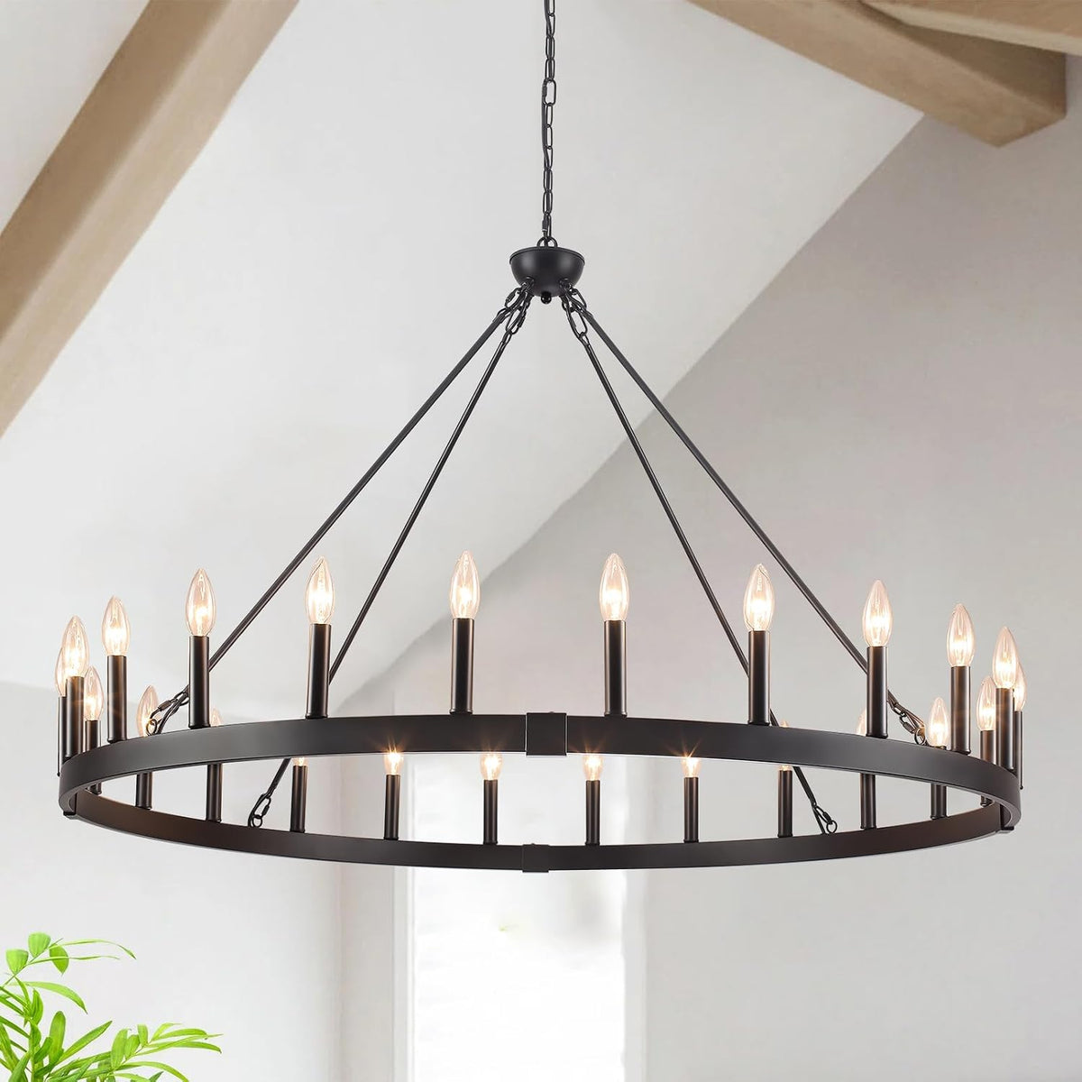 Side view of a black metal orb chandelier showing its slim candle sockets and hanging rods