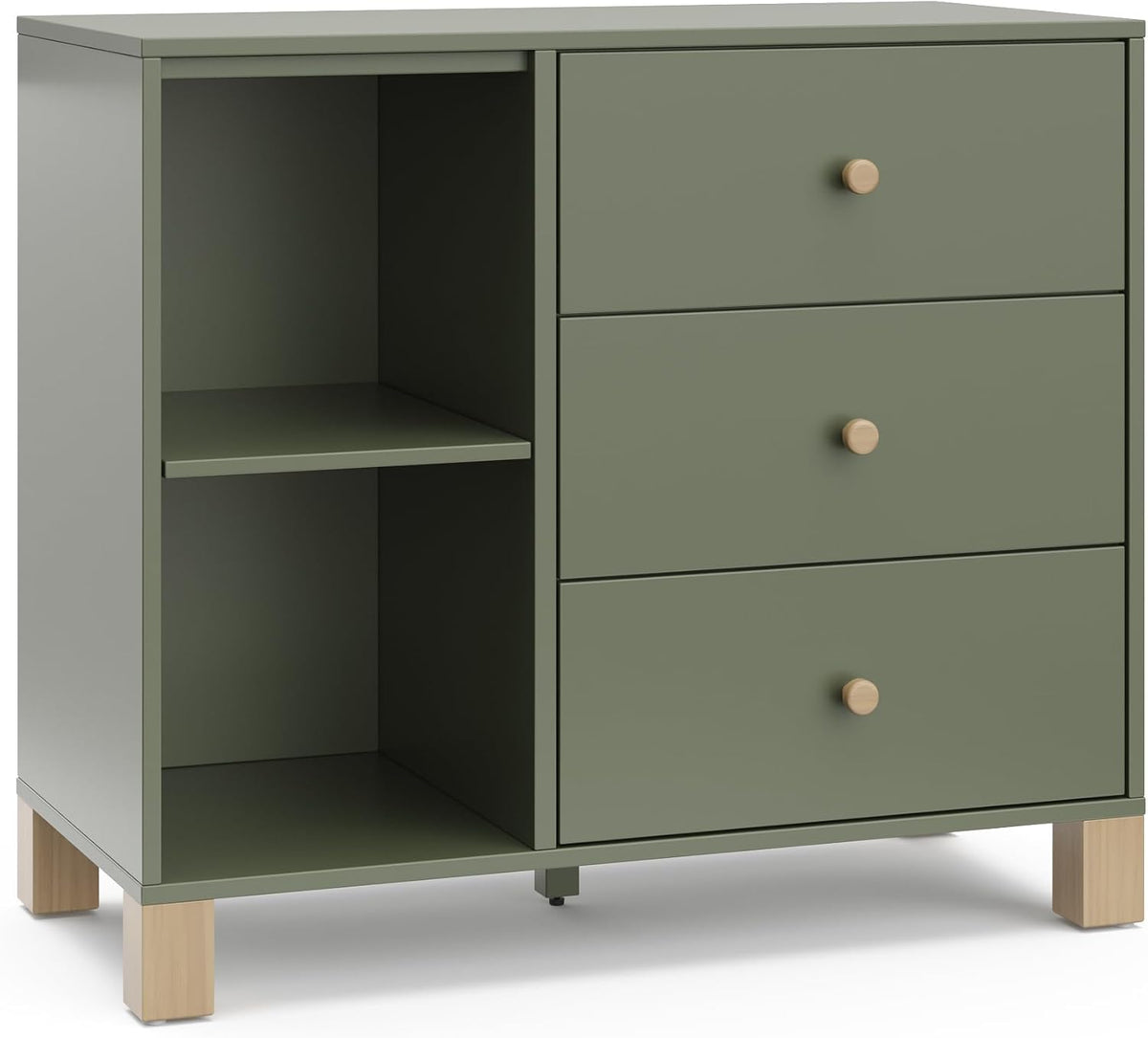 Three-drawer sage-green dresser with open left shelving, round wood knobs, and light wood legs.