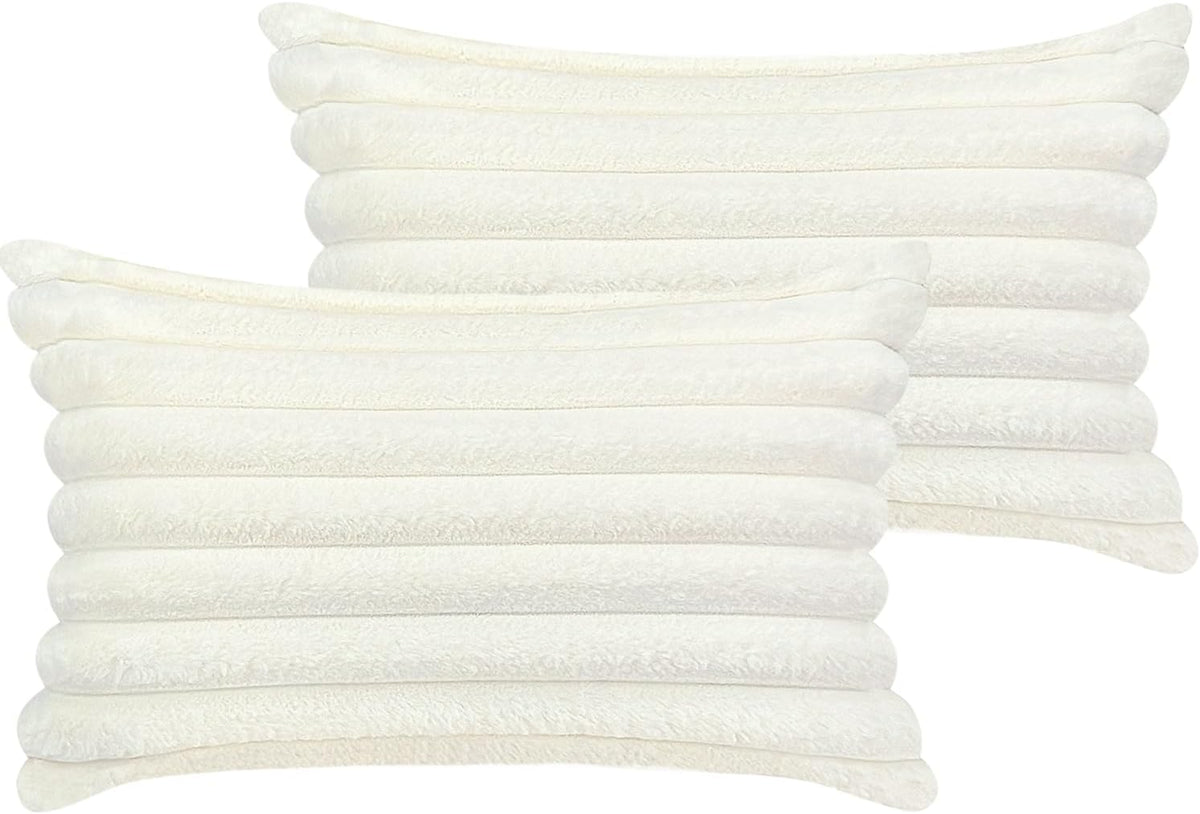 Set of two cream white faux-fur pillow covers with soft horizontal ribbed texture