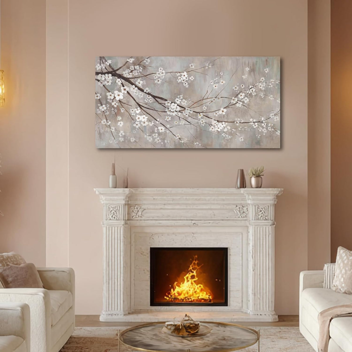 Plum blossom canvas mounted over a mantel above a lit fireplace in a living room.