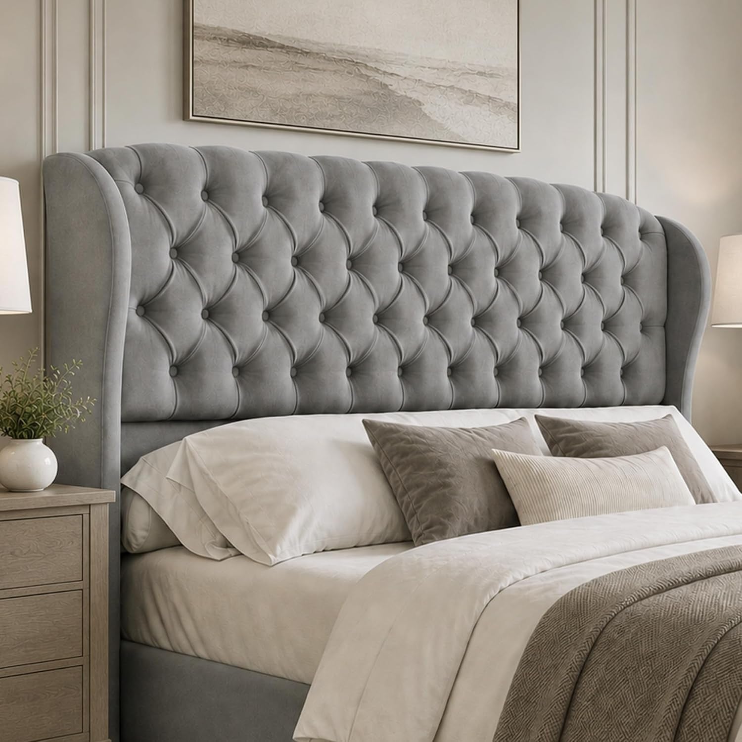 Left-side view of a light gray tufted wingback headboard showing the curved wing profile.