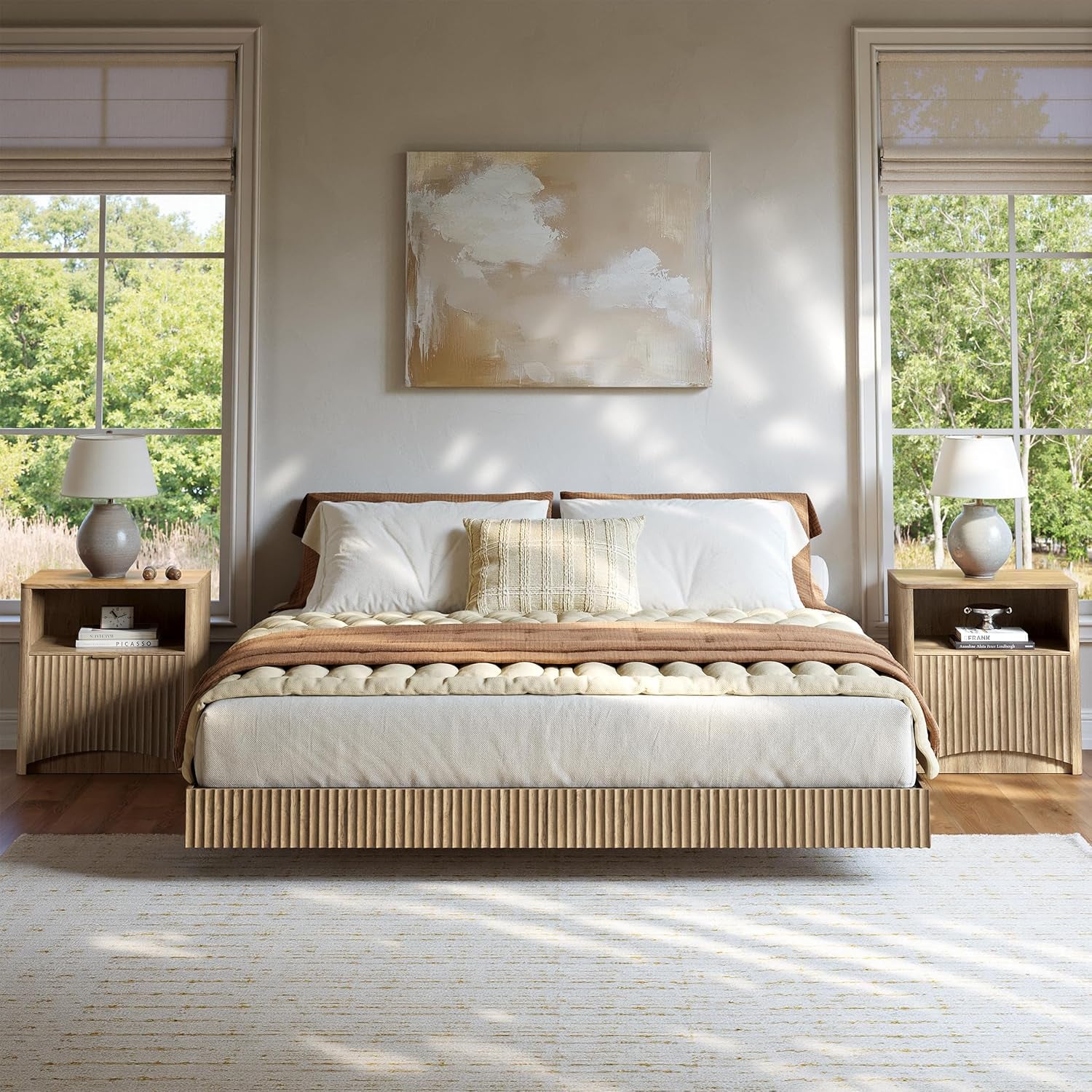 Natural beech floating bed with fluted base and two matching nightstands, front view in a bright bedroom