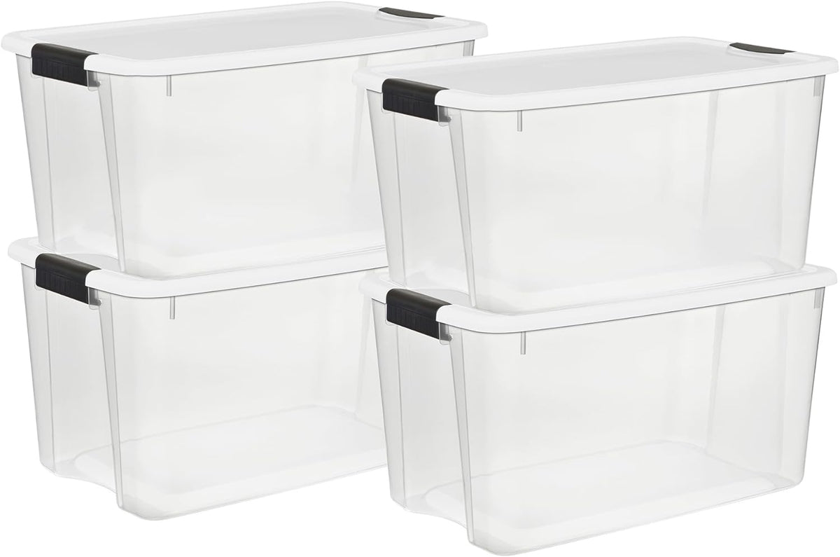 Four clear plastic storage bins with white lids and black latches stacked in two columns on a white background.