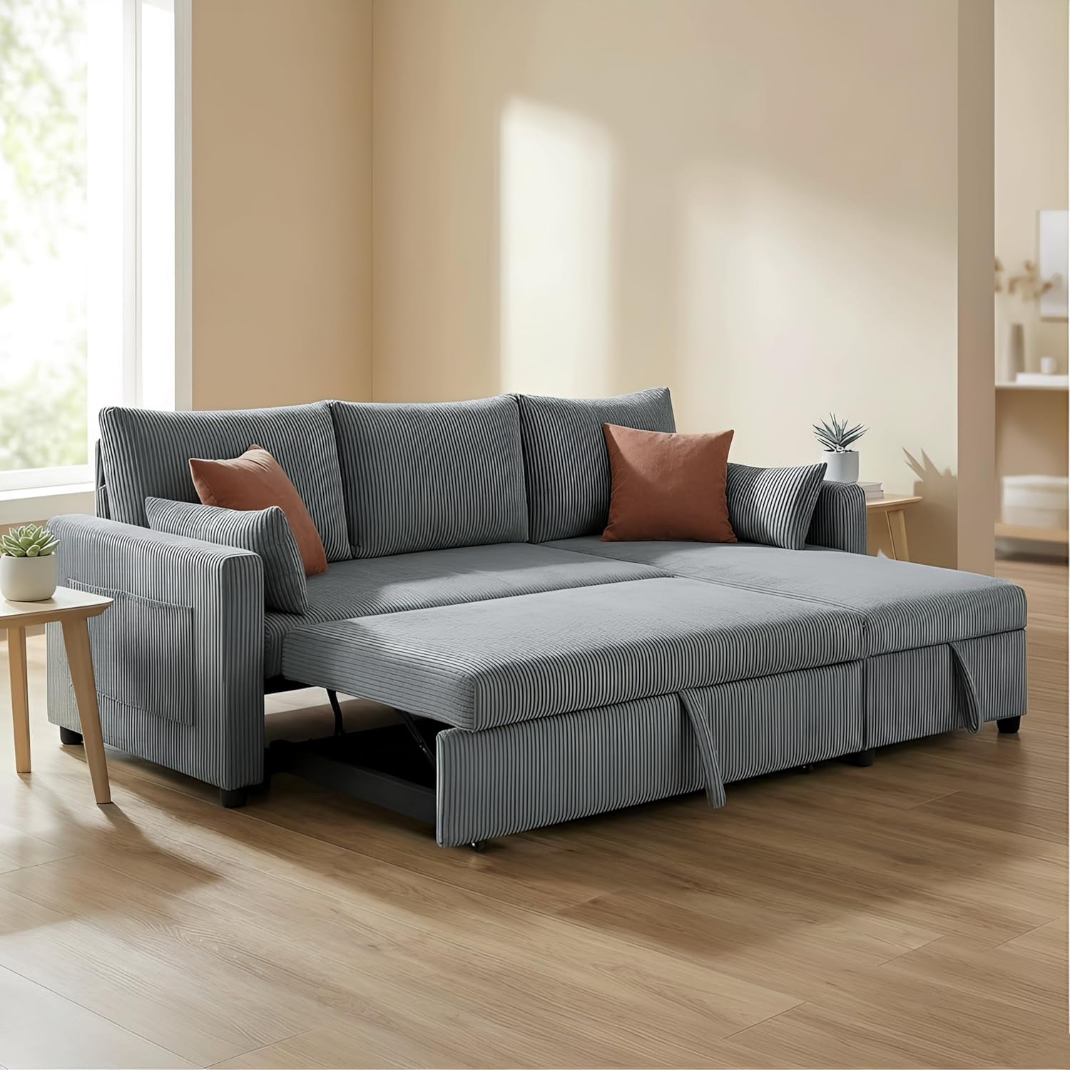 Front view of the sectional with the sleeper pulled fully out creating a wide sleeping surface.