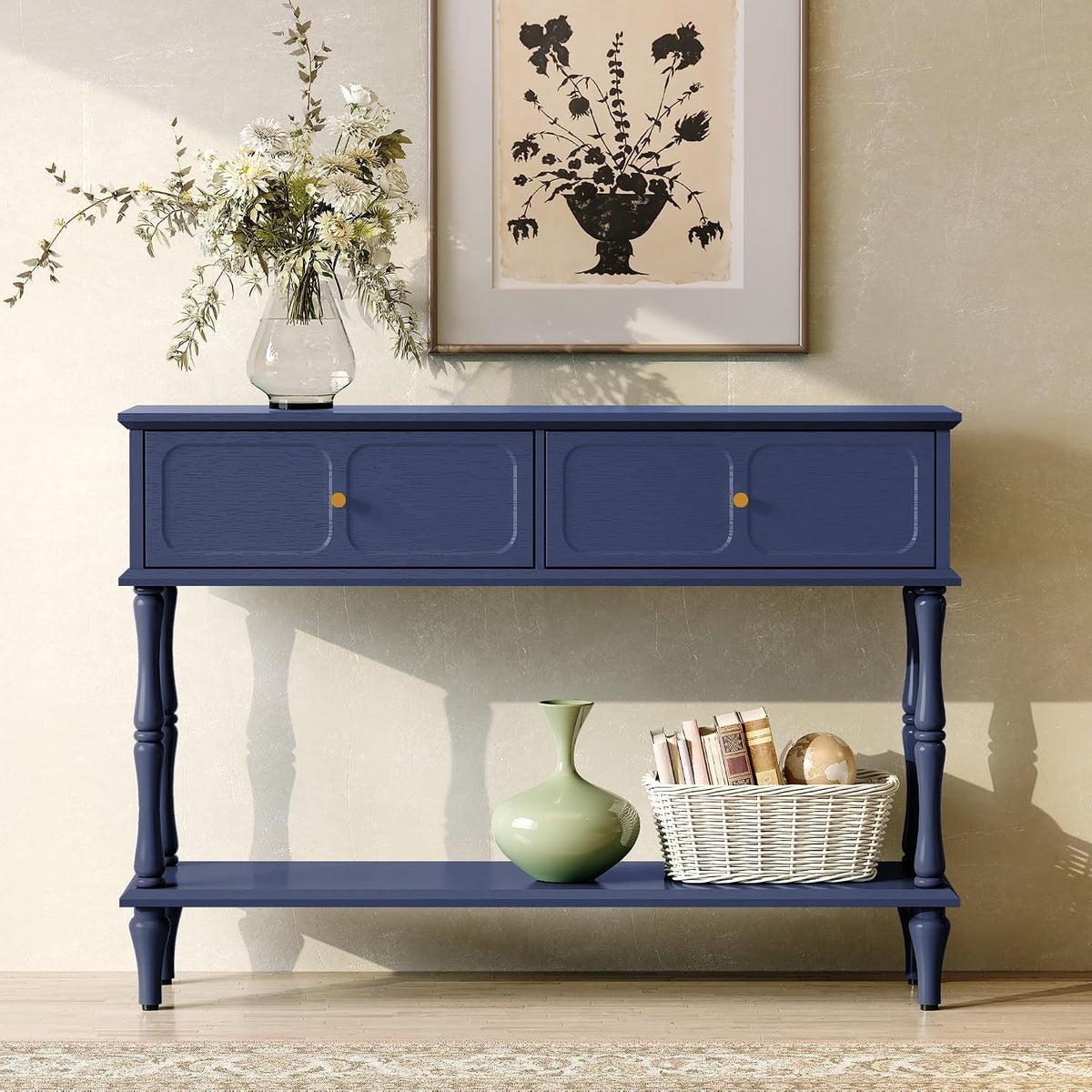 Styled living-room view of the console table painted deep blue with a vase and basket on the shelf.