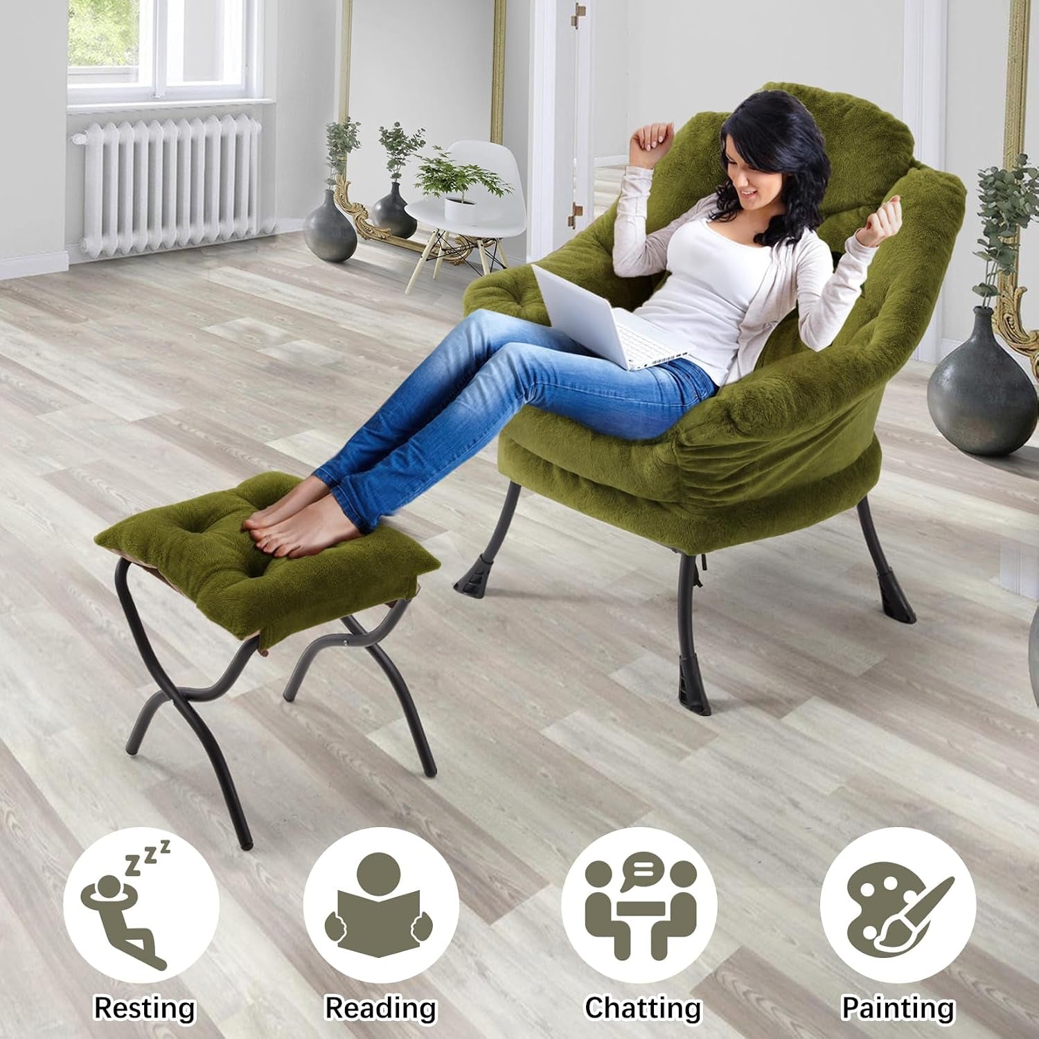 Woman relaxing in a green plush armchair with matching ottoman in a bright living room