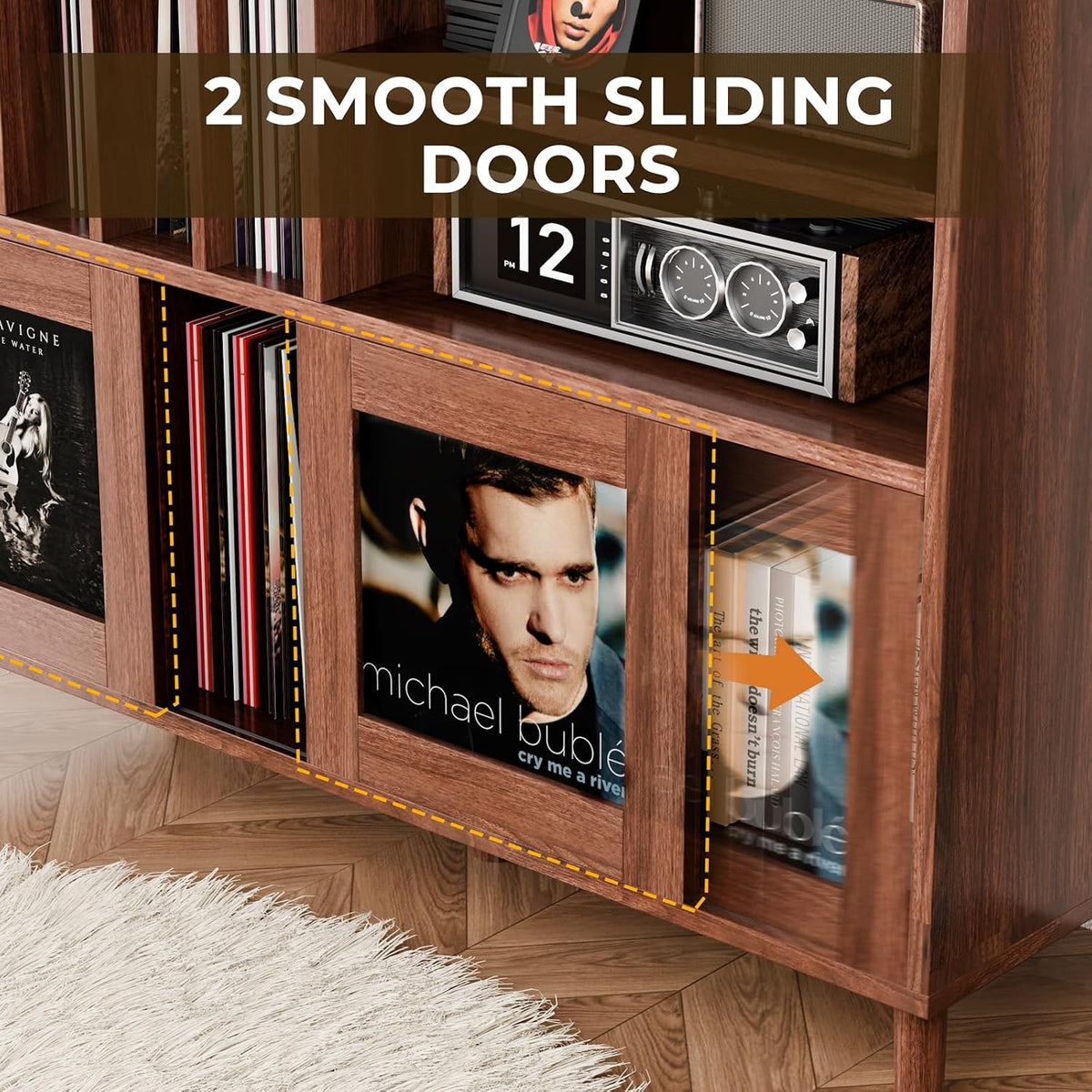 Close-up of the cabinet's lower front showing sliding wood-framed doors and vinyl records inside.