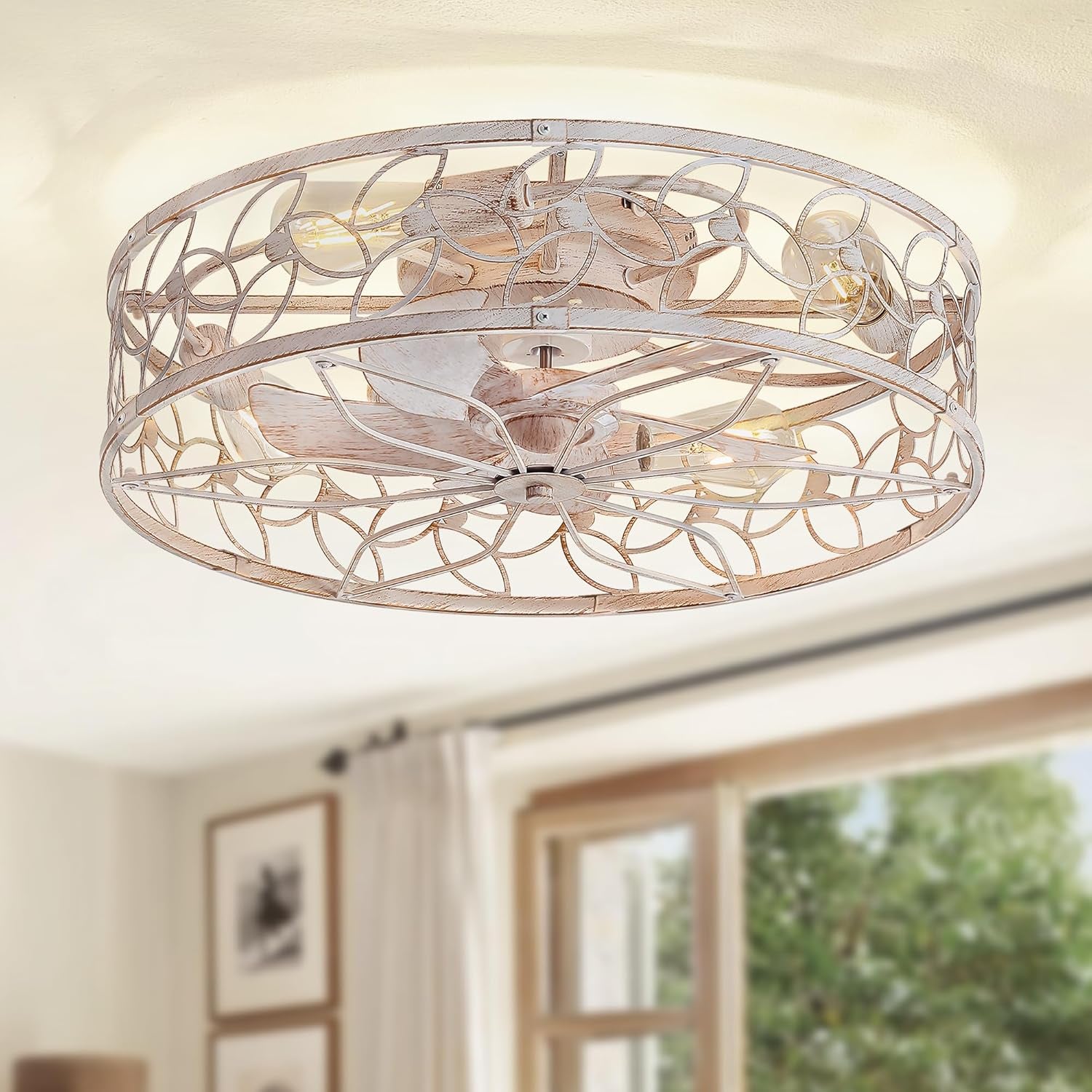 White-and-gold caged 23-inch flush-mount ceiling fan angled front view in a bright living room