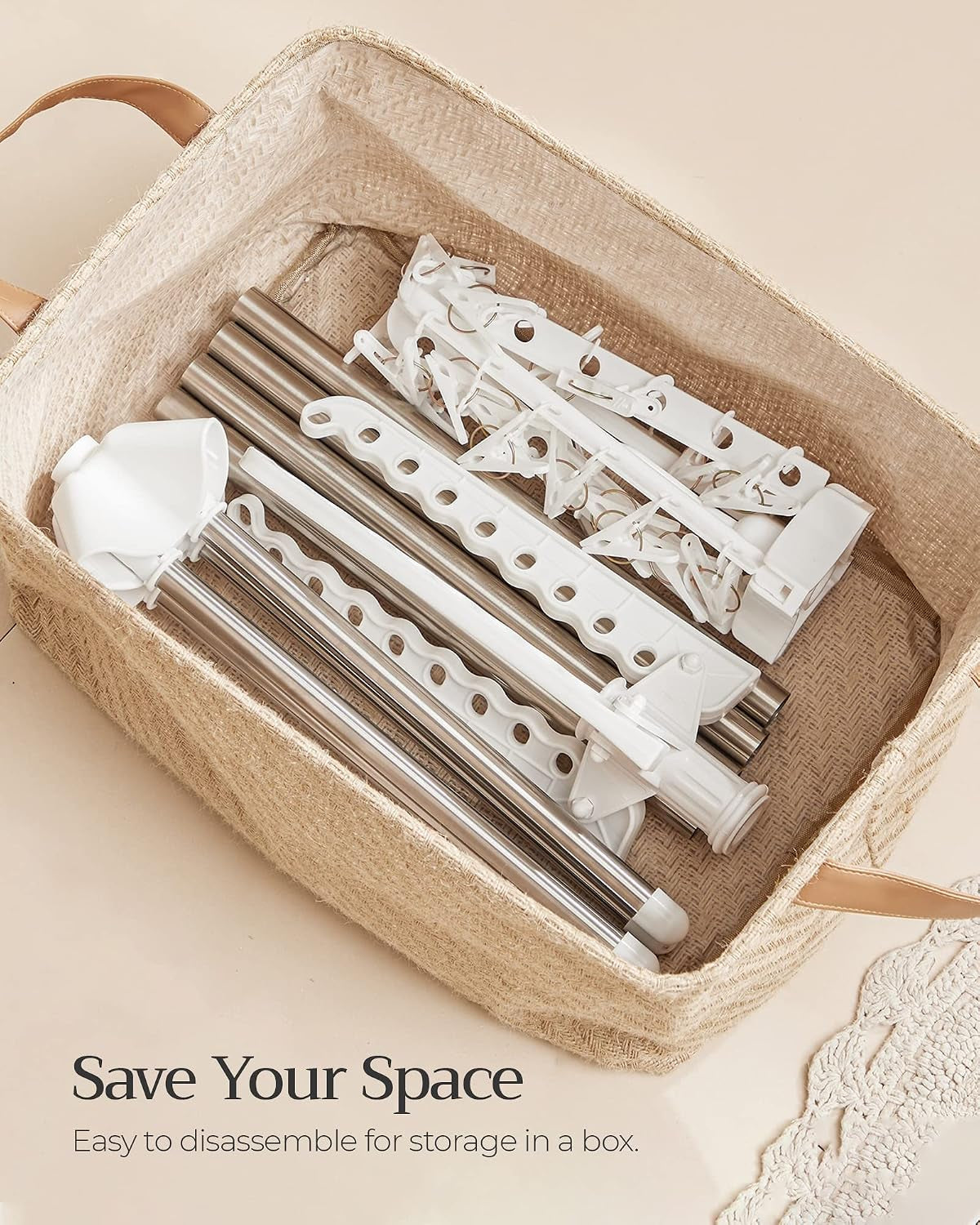 Disassembled metal poles and white plastic arms and clips neatly placed inside a woven storage basket
