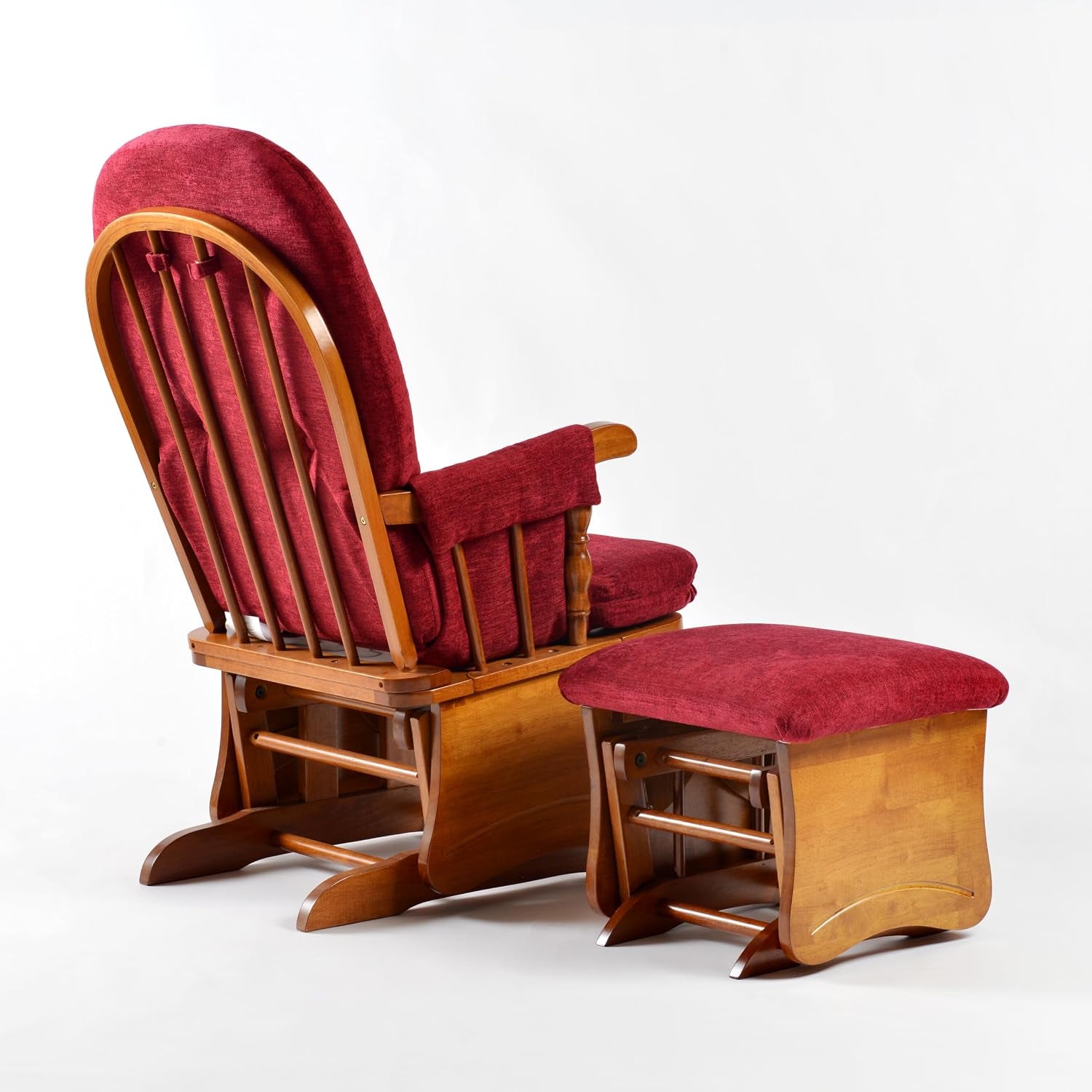 Rear-side view of the red upholstered glider and ottoman showing slatted wood back and oak-finish base.