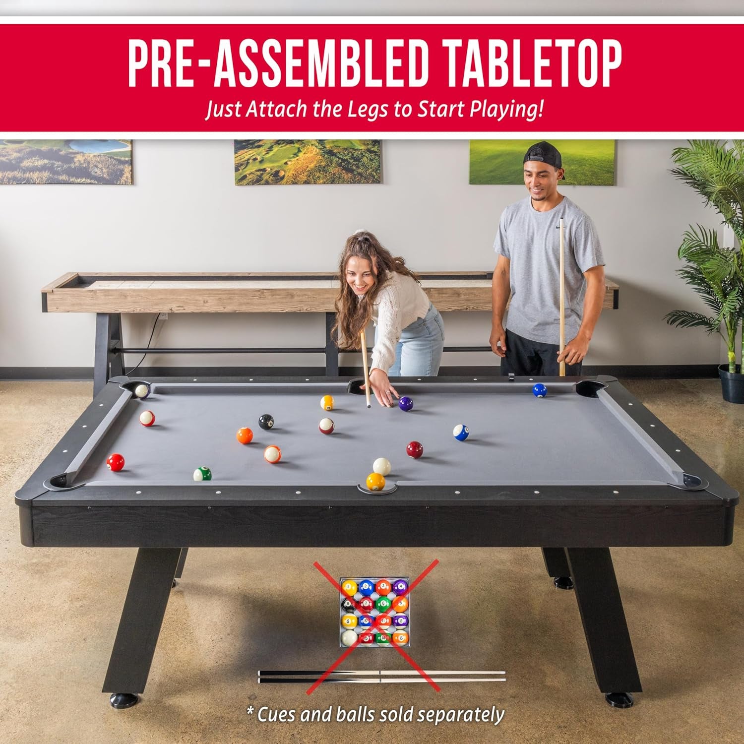 Front-facing view of the pool table with players and balls, showing attached legs and playing surface