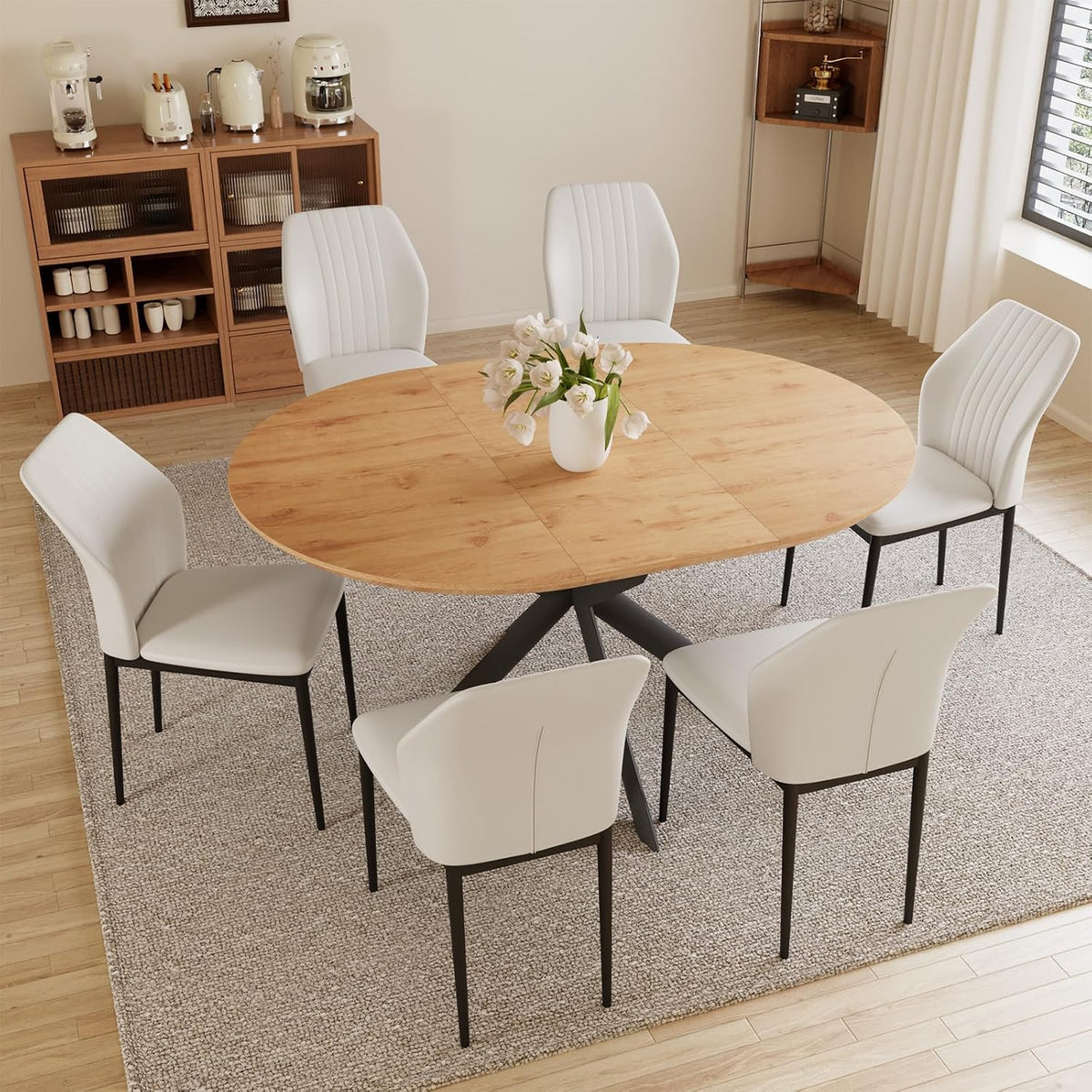 Oak extendable round table surrounded by six white chairs on a textured rug in a dining area