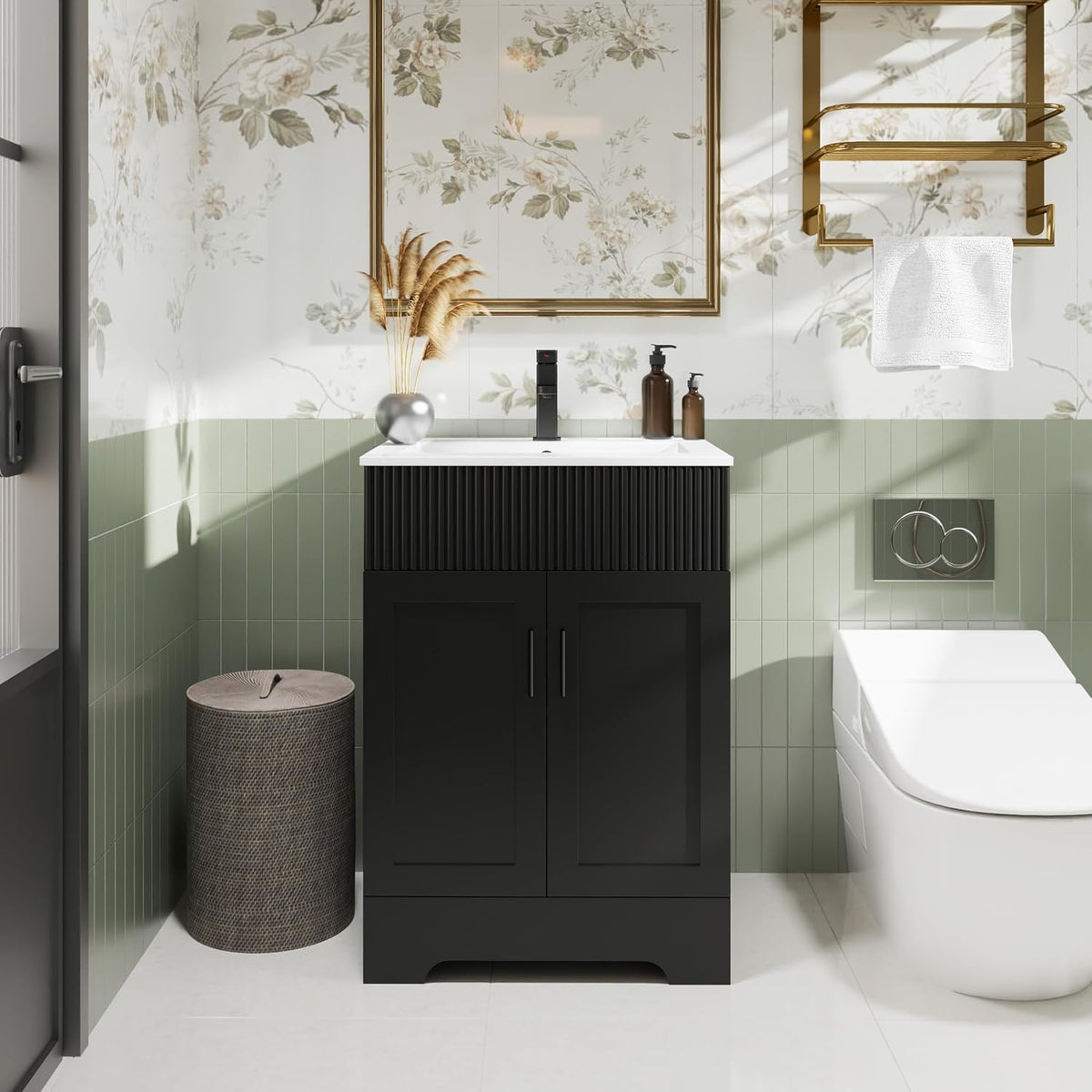 Black single-sink vanity in compact bathroom with gold towel rack and green tile wainscot