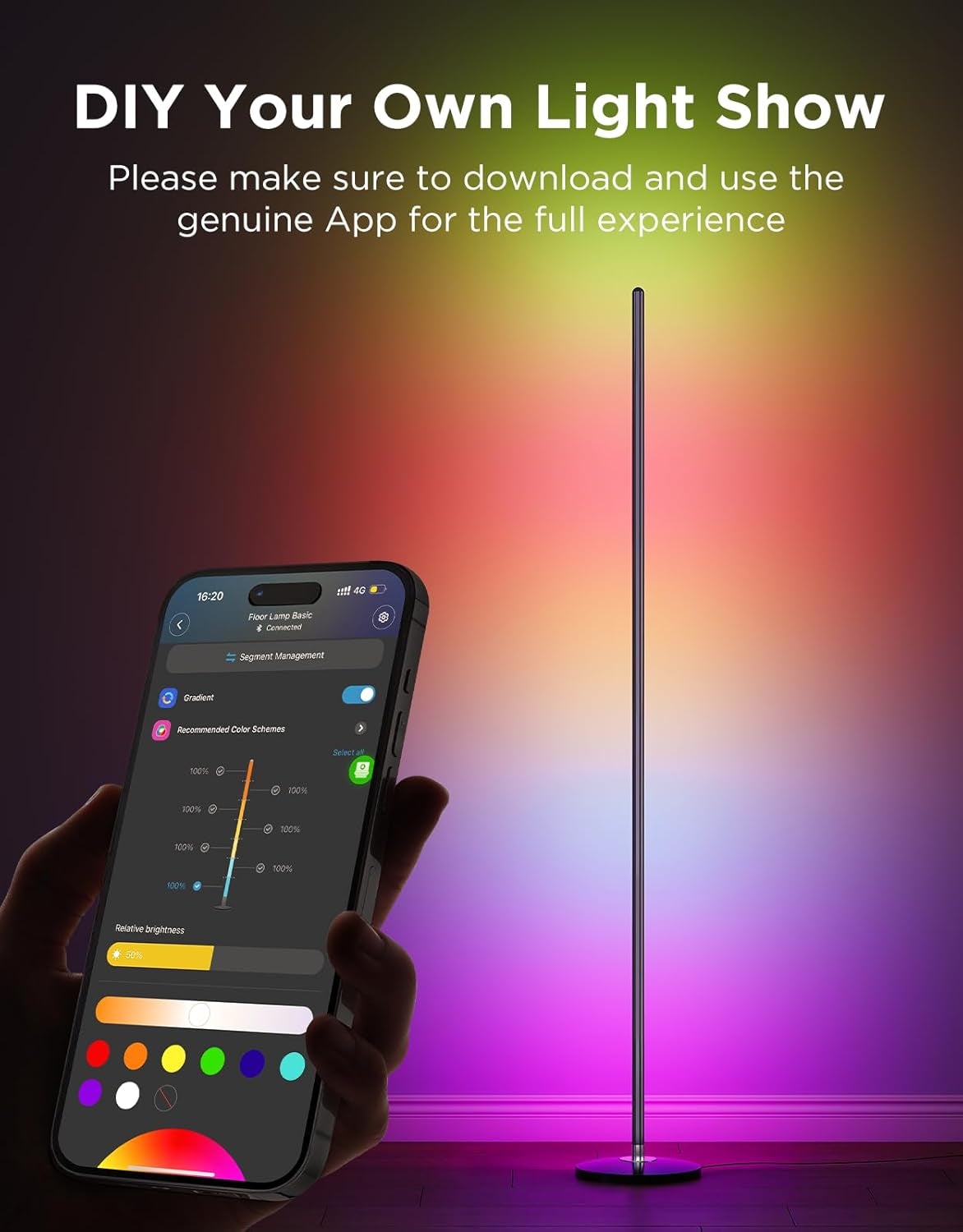 Close-up of a phone app controlling lamp colors beside a slim floor lamp glowing pink and orange on the wall