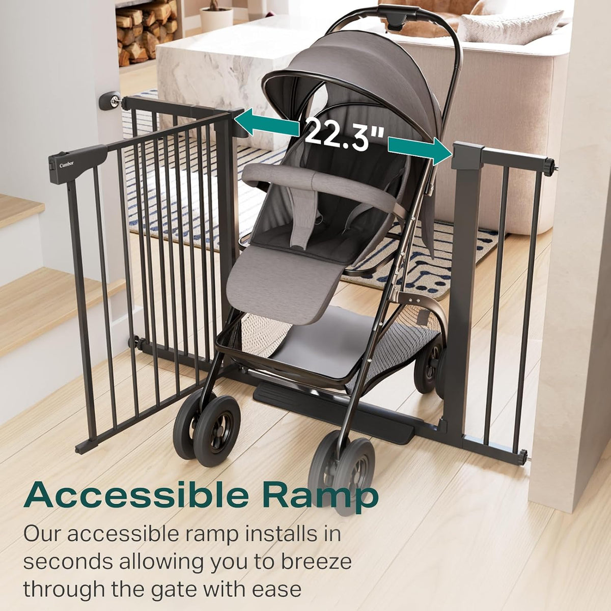 Angled view of the gate's accessible ramp with a gray stroller positioned through the opening on a wood floor.