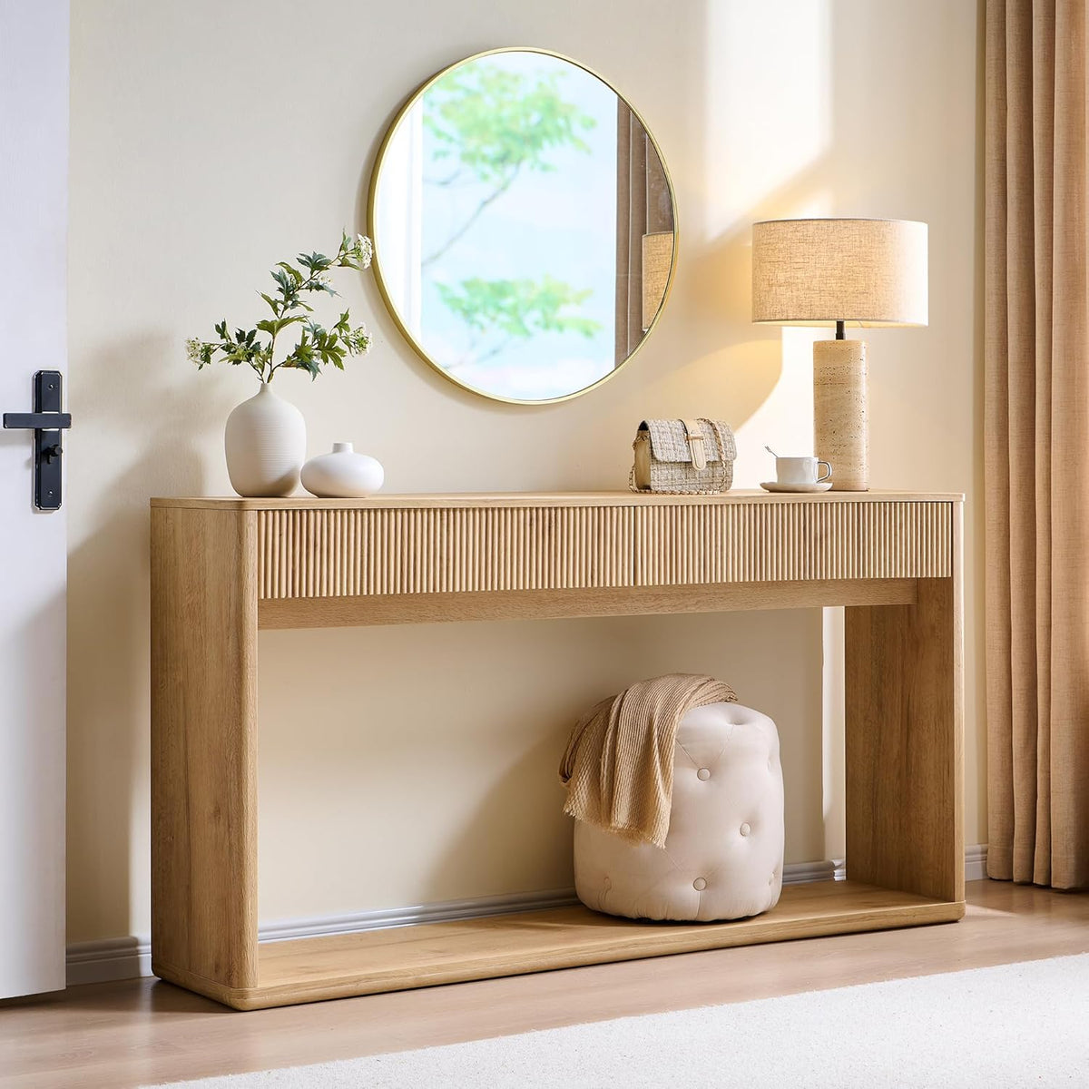 Natural oak console table styled in an entryway with lamp, mirror and decorative vases on top