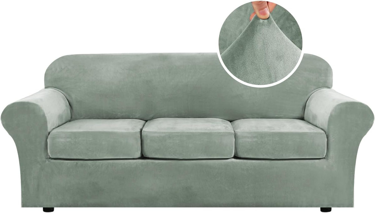 Front view of a three-cushion sofa in muted sage green with a circular inset of a hand pinching the velvet.