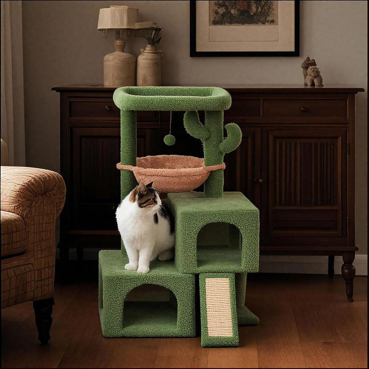 Assembled cat tree in a living room setting with a cat at the lower condo