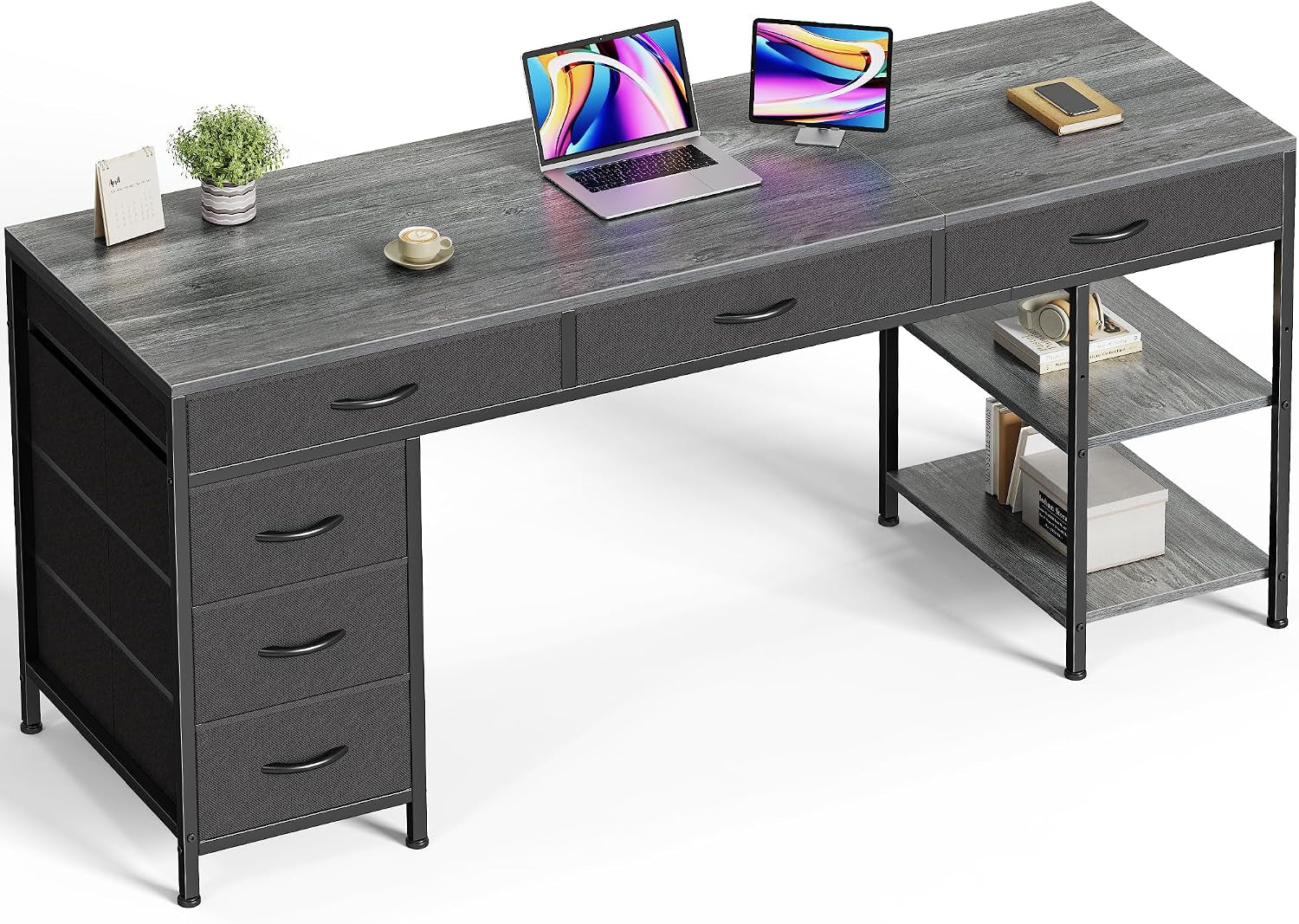 Angled view of the desk in weathered gray showing woodgrain top, drawer fronts and two-tier open shelving