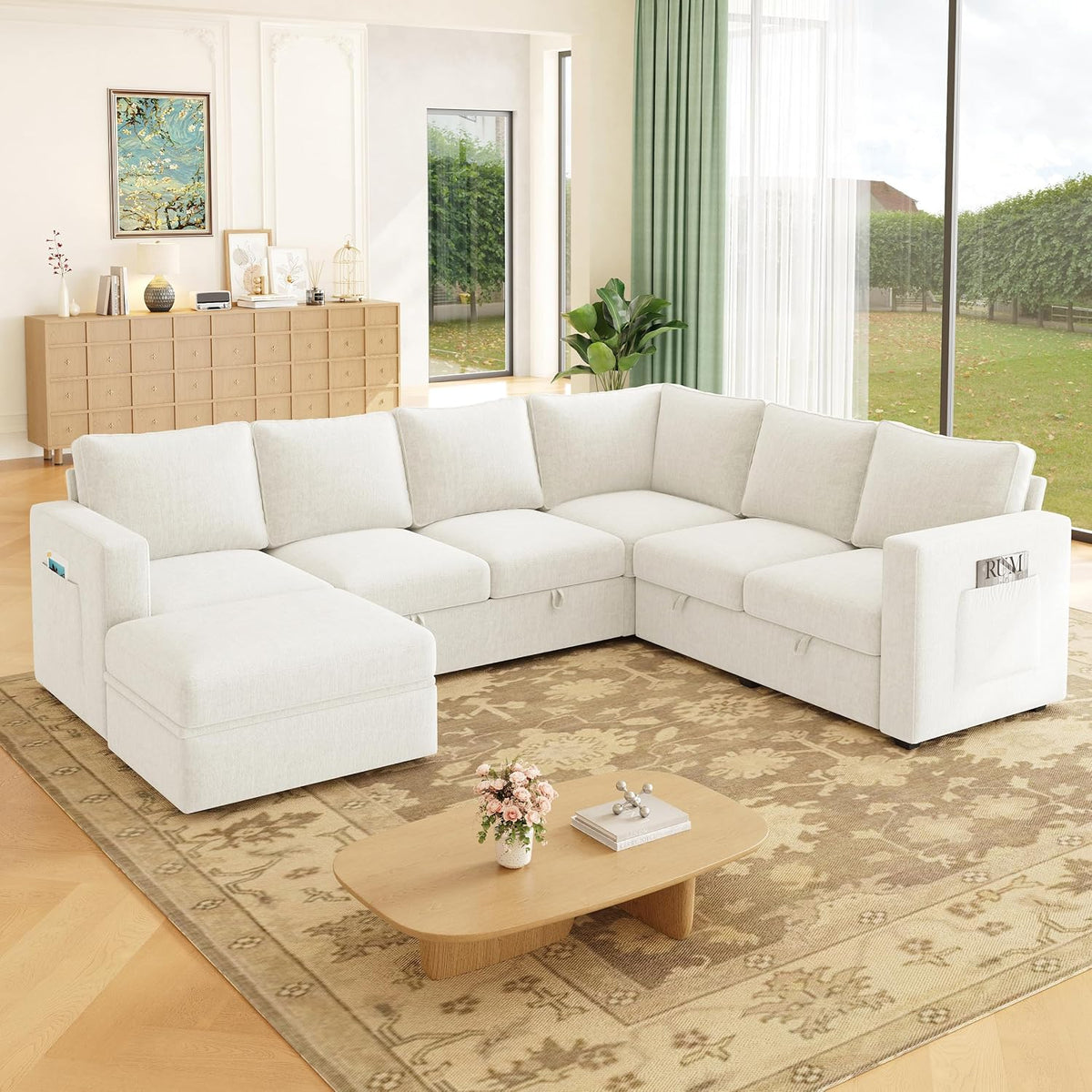 Cream chenille sectional in sunlit living room with detachable chaise and visible side storage pocket