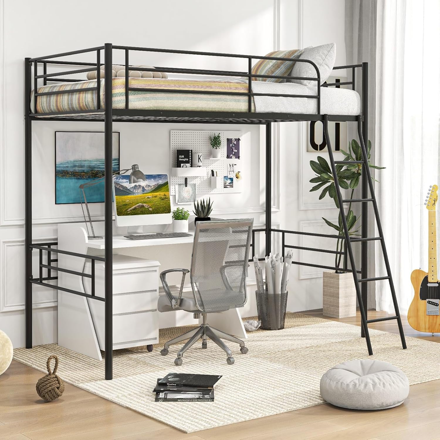 Black metal twin loft bed over a white desk and rolling chair, ladder on right in a bright styled room.