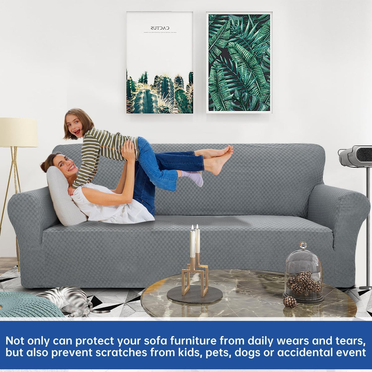 Straight-on living room view of gray check-pattern slipcover on sofa with woman and child playing