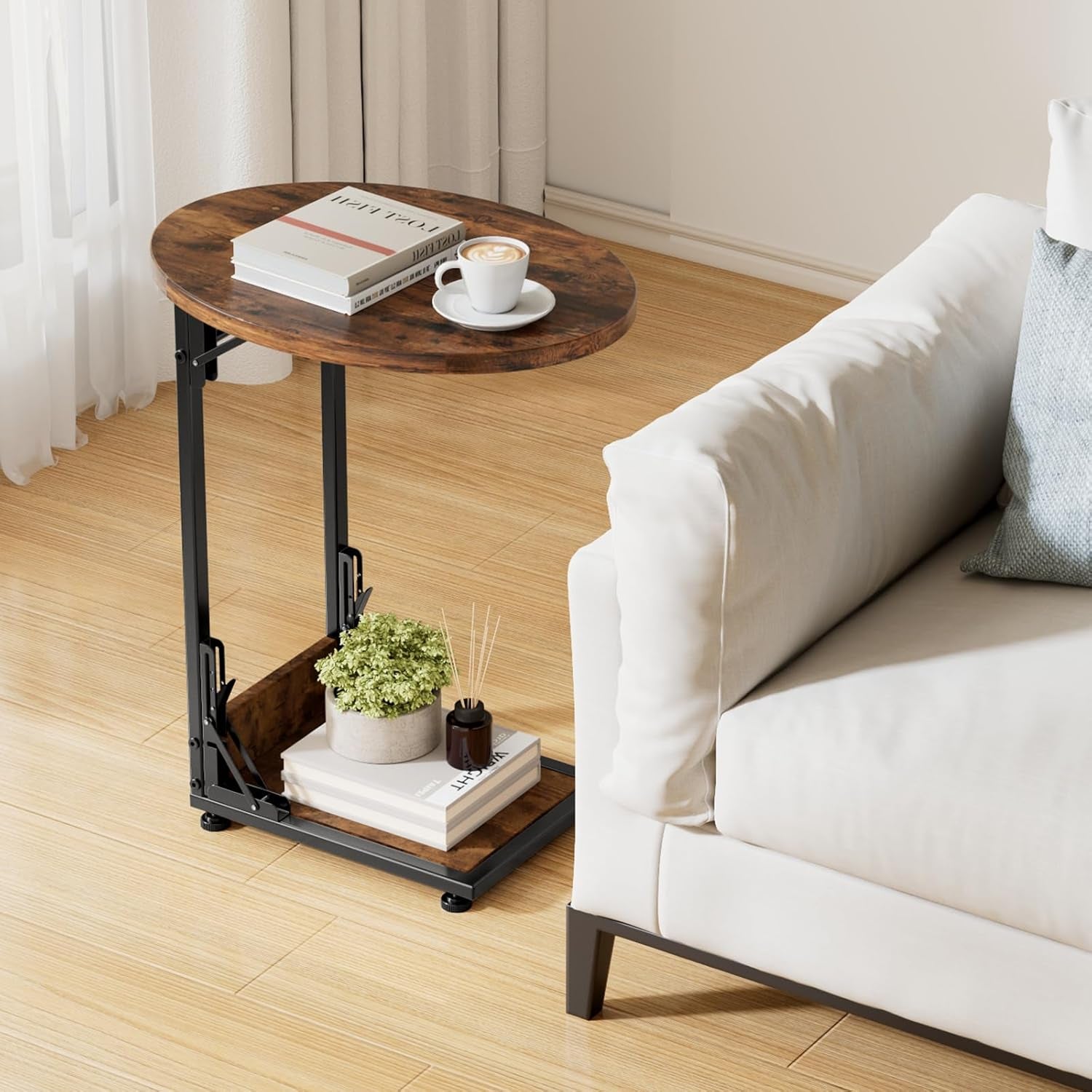 Small curved-top side table beside a light-colored sofa on wood floor, showing two-tier storage
