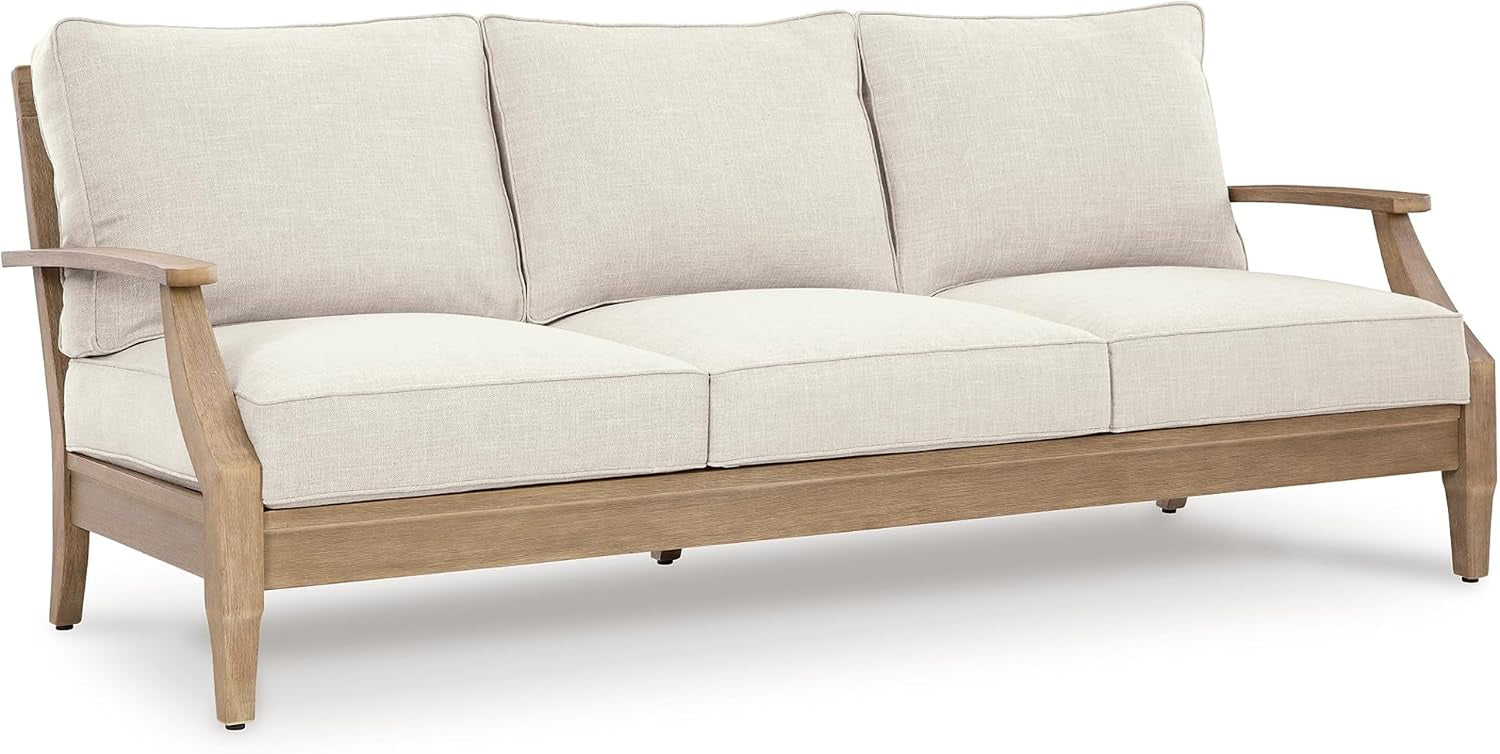 Three-seat sofa on a white background showing beige cushions and light eucalyptus wood frame