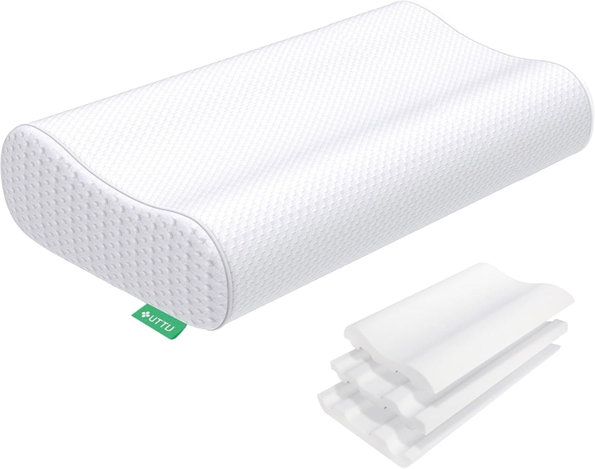 White contour cervical pillow angled front view with stacked removable foam layers visible at lower right