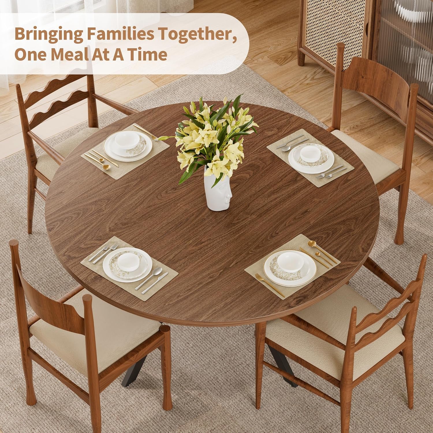 Top-down view of the 42-inch round tabletop set for four with floral centerpiece