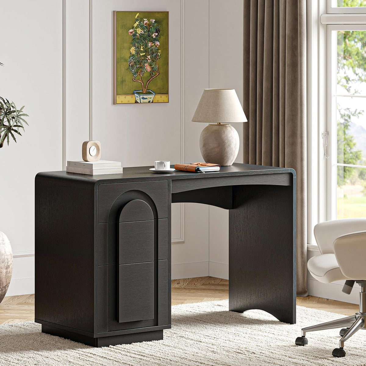 Black computer desk side-front view with lamp on top showing rounded corners and arch detail