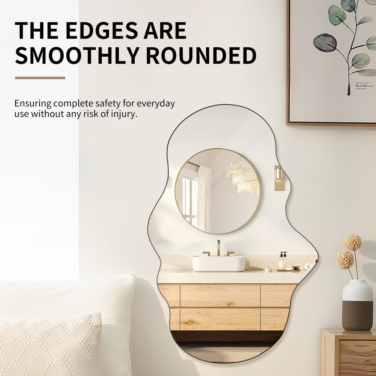 Cloud-shaped frameless mirror above a vanity reflecting a round gold mirror and wood drawers in a bathroom vignette
