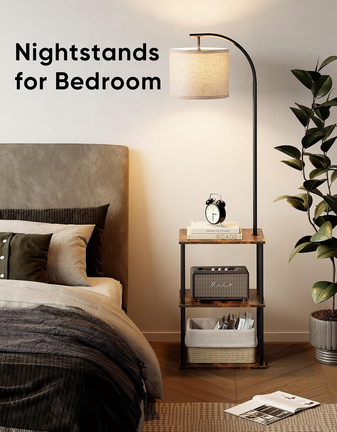 Bedroom view with the lamp table as a nightstand beside a bed, lamp turned on.