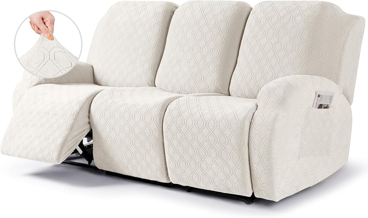 Front view of a cream three-seat recliner covered in textured slipcover, left seat reclined with fabric-stretch inset.
