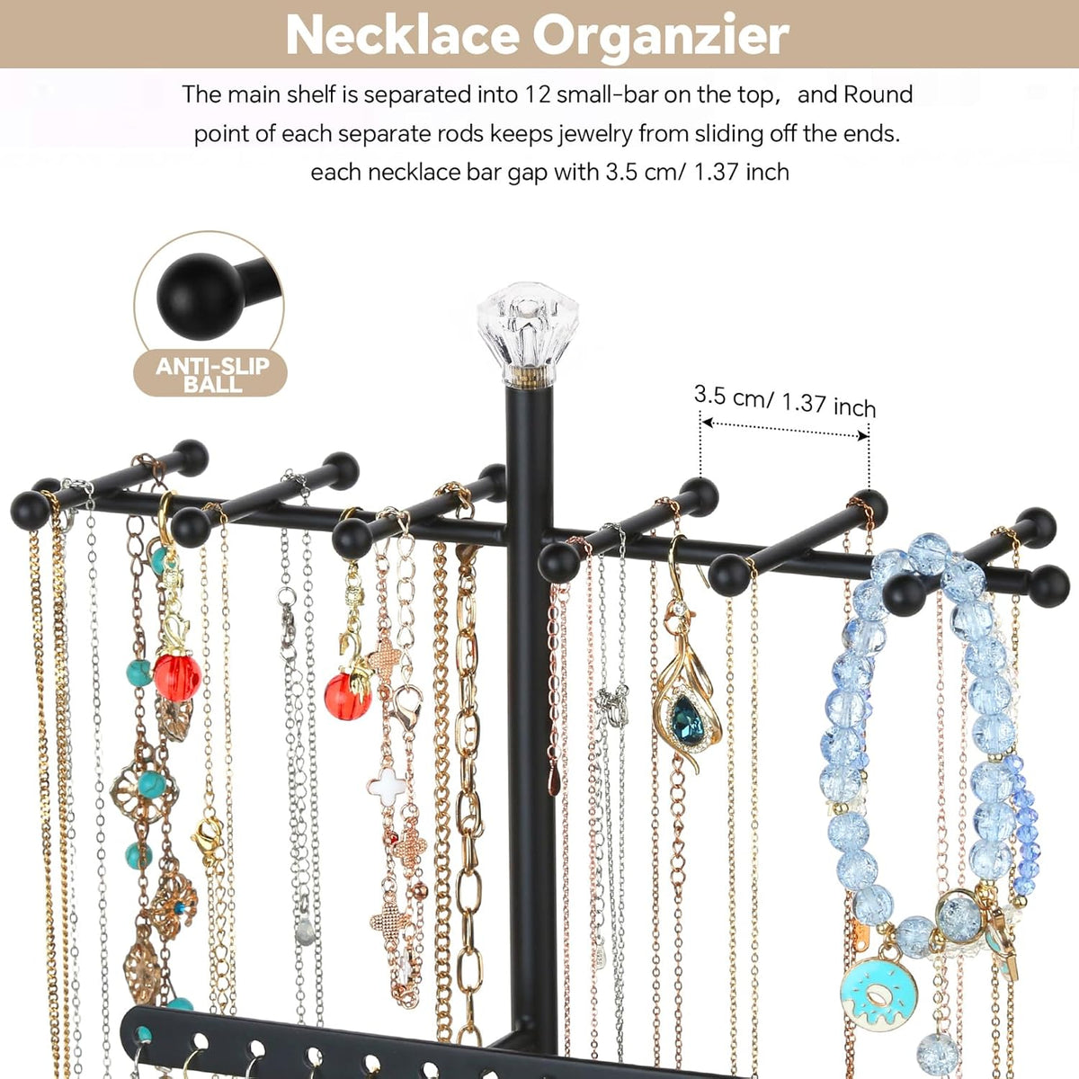 Close-up of black metal necklace bars and spaced hanging chains showing round anti-slip ball ends and spacing