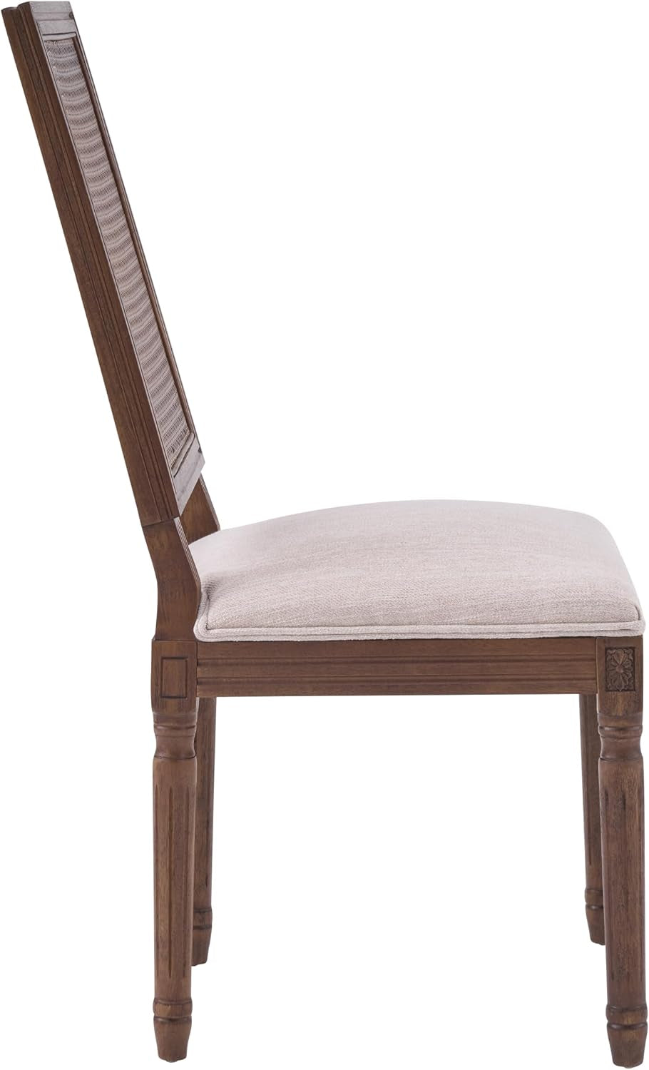 Side profile of a dining chair showing beige upholstered seat, straight cane back and carved walnut legs.