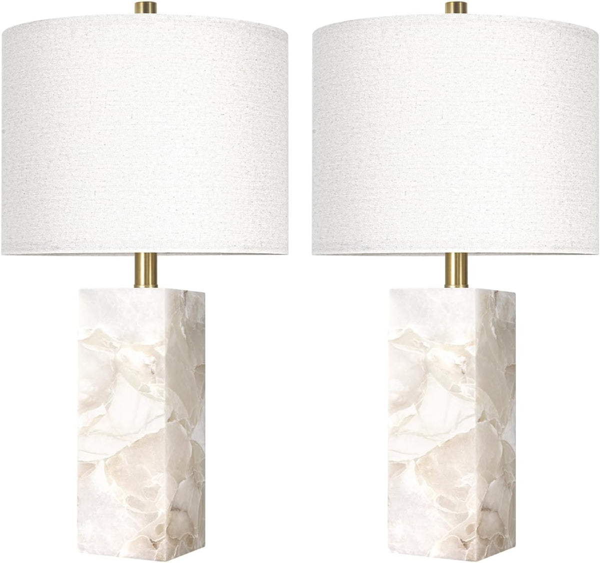 Pair of alabaster column lamps on white background, cropped to show rectangular bases and white drum shades.