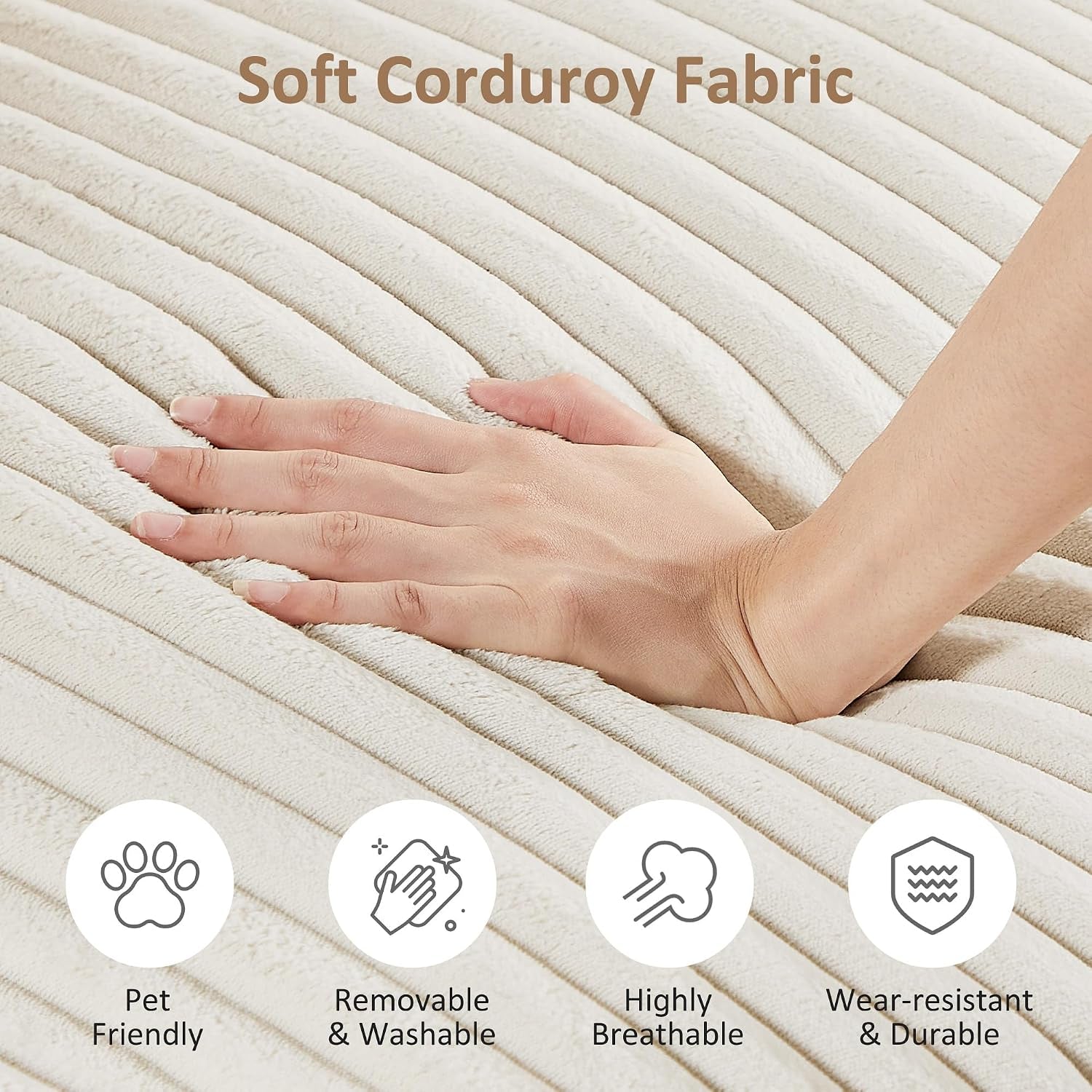 Close-up of beige corduroy fabric with hand pressing into the plush ridged texture