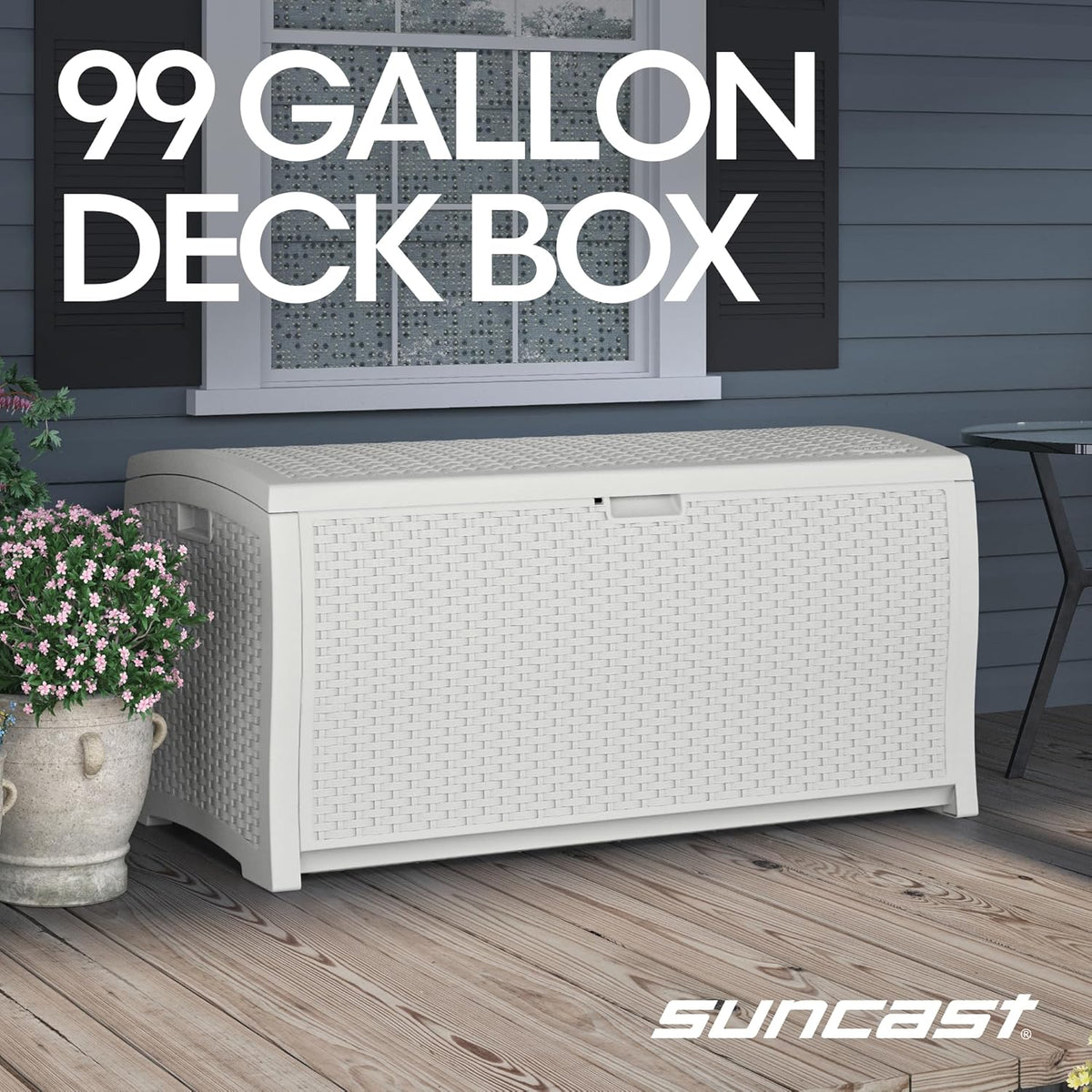 White horizontal deck box placed on a wooden porch floor with black shutters behind