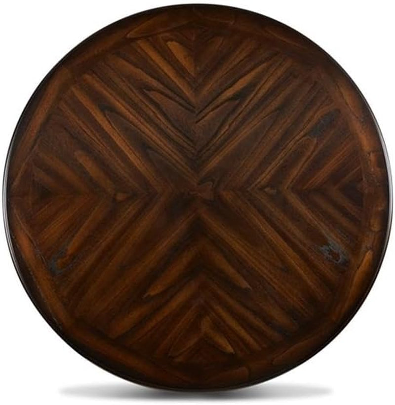 Top-down view of the round tabletop showing a reverse-diamond patterned wood veneer grain