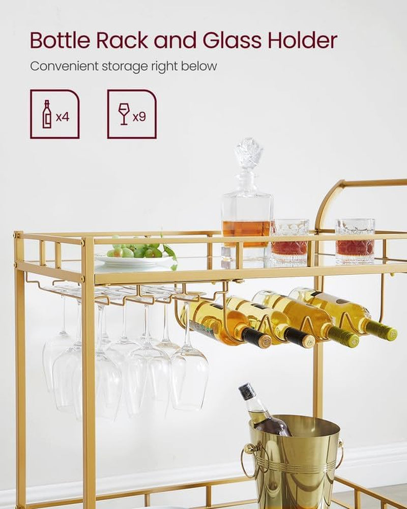 Close-up of a gold bar cart showing hanging wine glasses and four bottles stored in a horizontal rack